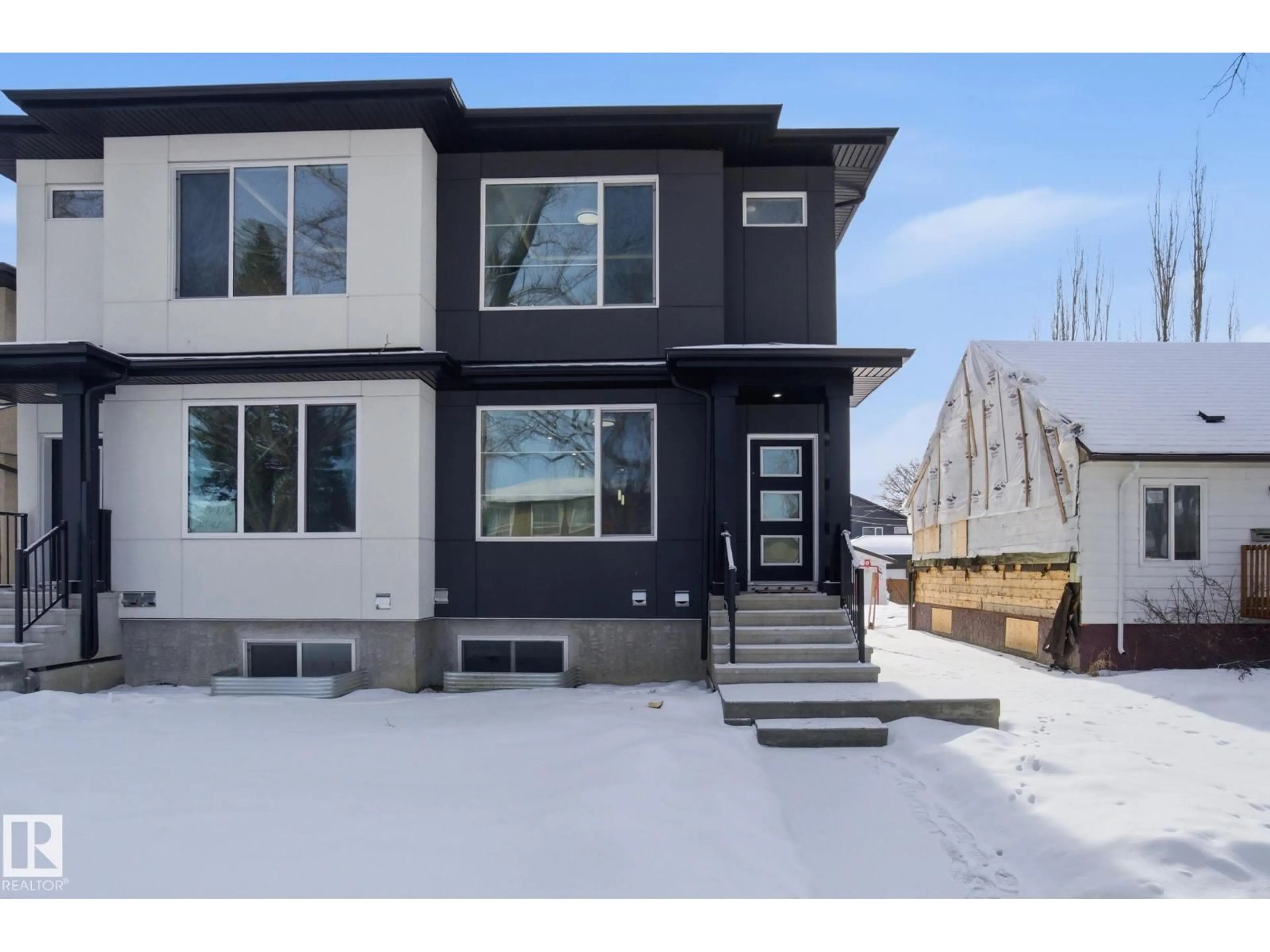 Home with vinyl exterior material, street for 10725 70 AV, Edmonton Alberta T6H2G4