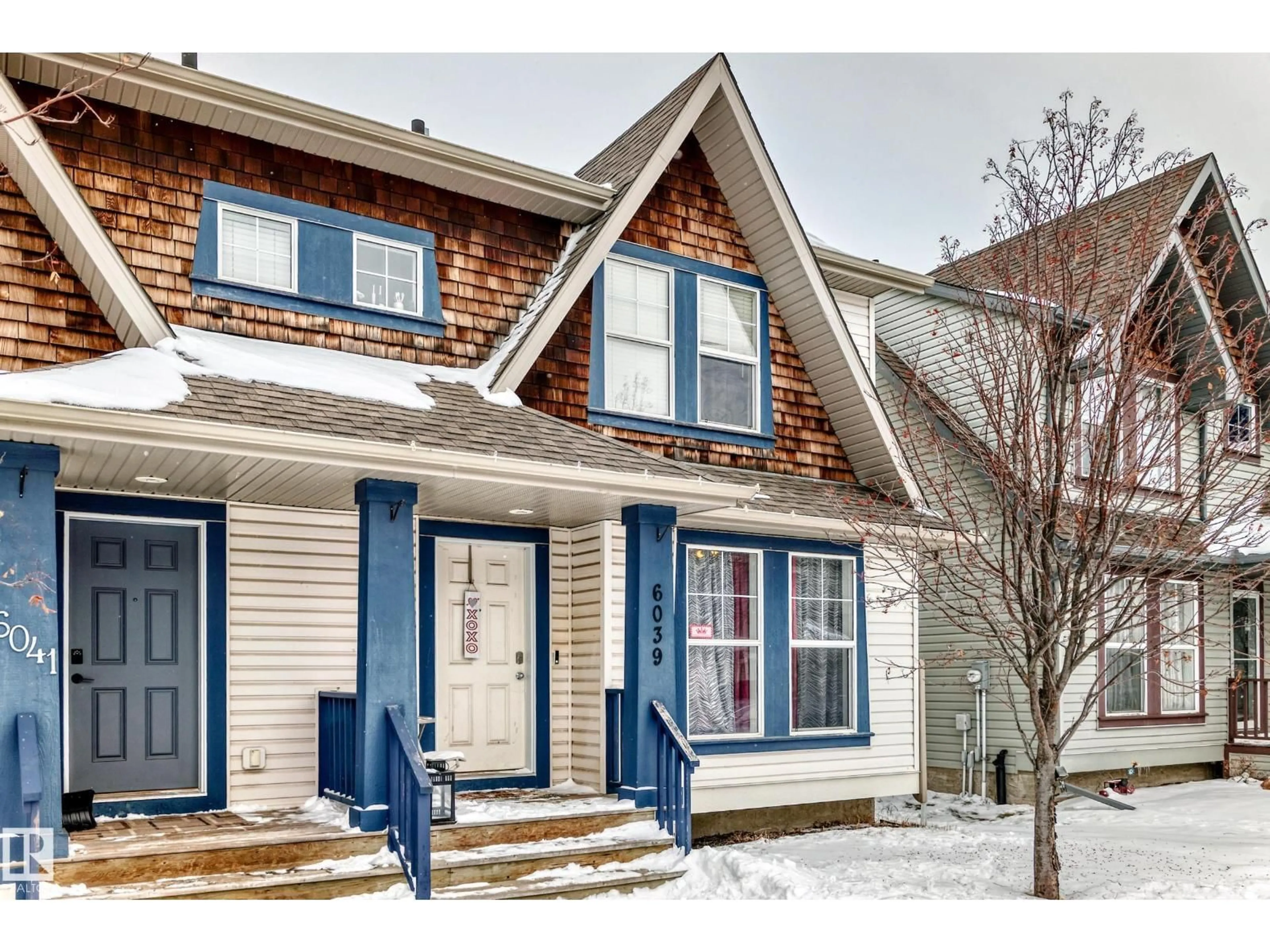 Home with vinyl exterior material, street for NW - 6039 214 ST, Edmonton Alberta T6M0K1