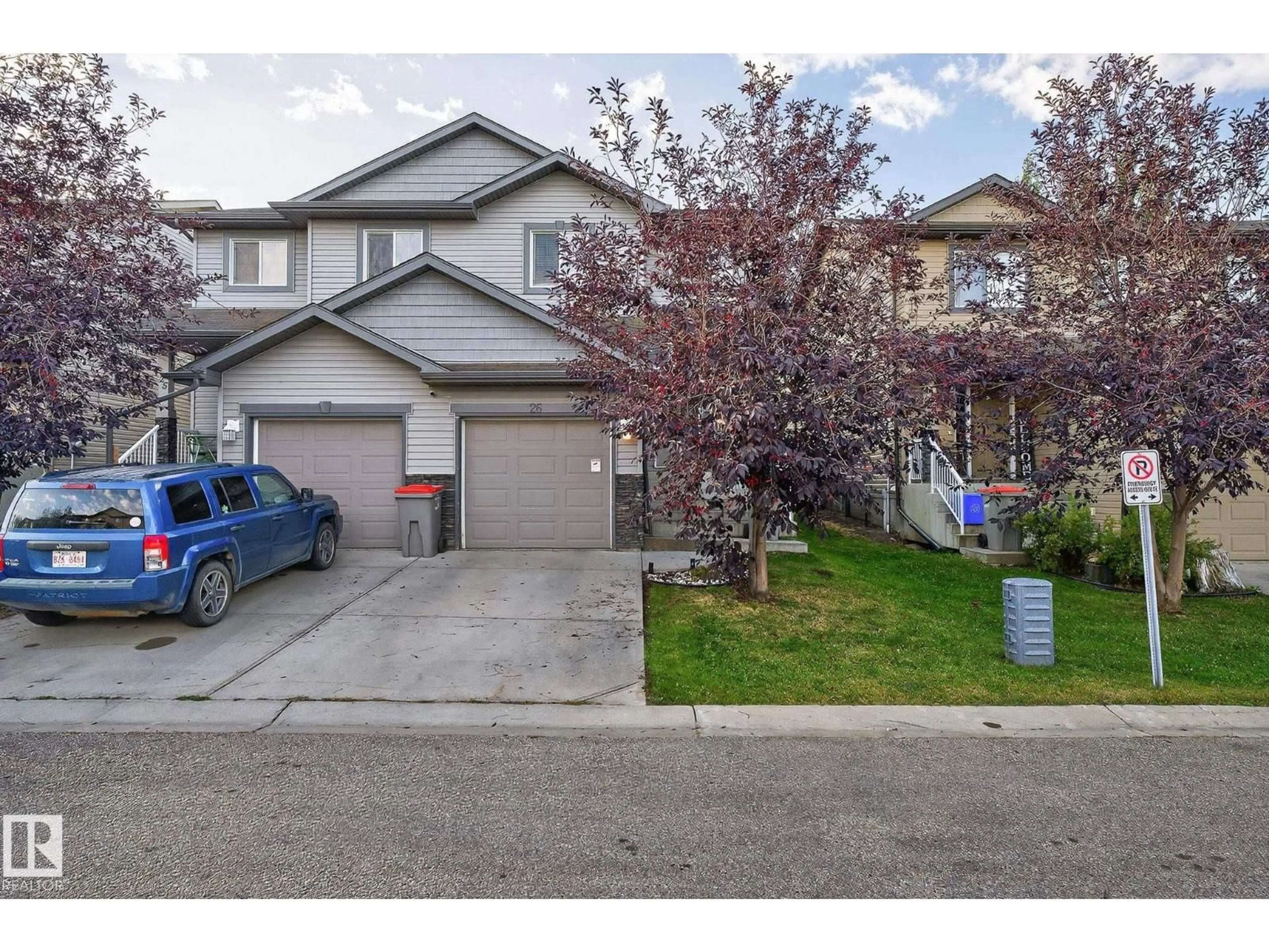 A pic from outside/outdoor area/front of a property/back of a property/a pic from drone, street for 26 85 SPRUCE VILLAGE DR, Spruce Grove Alberta T7X0L2