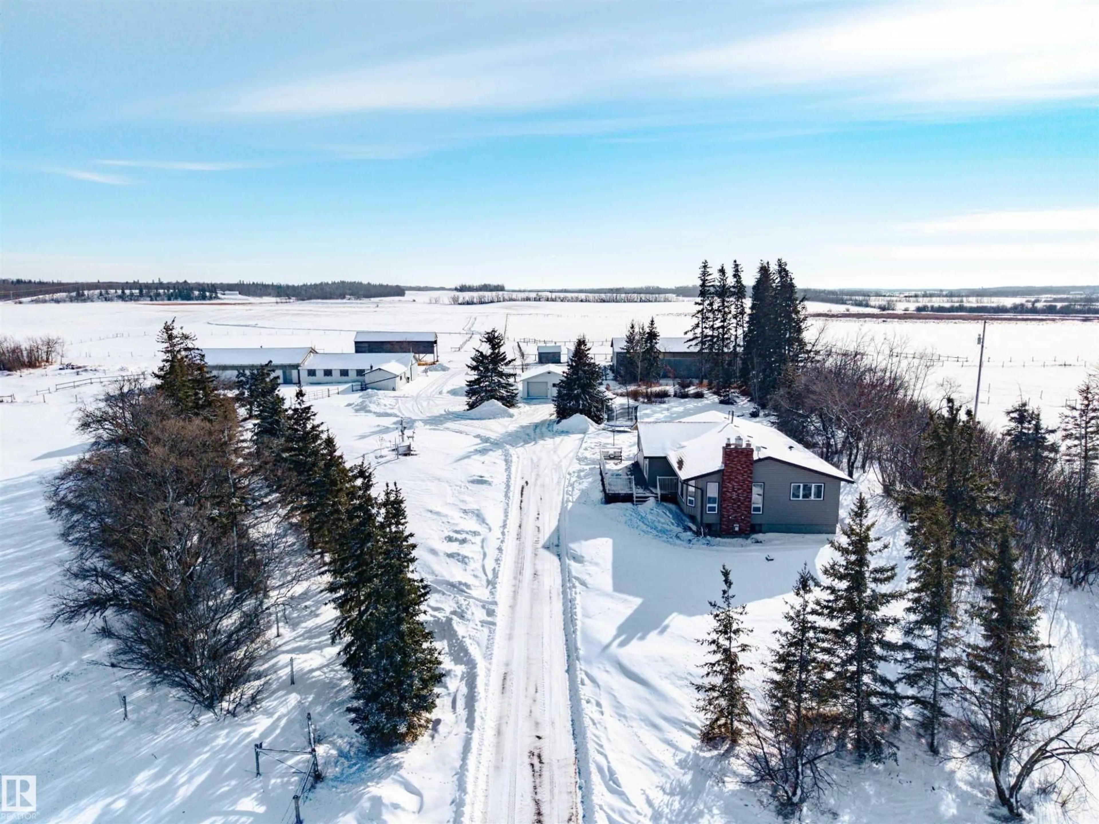 A pic from outside/outdoor area/front of a property/back of a property/a pic from drone, street for 22325 TOWNSHIP 502 NE, Rural Leduc County Alberta T0B3M2