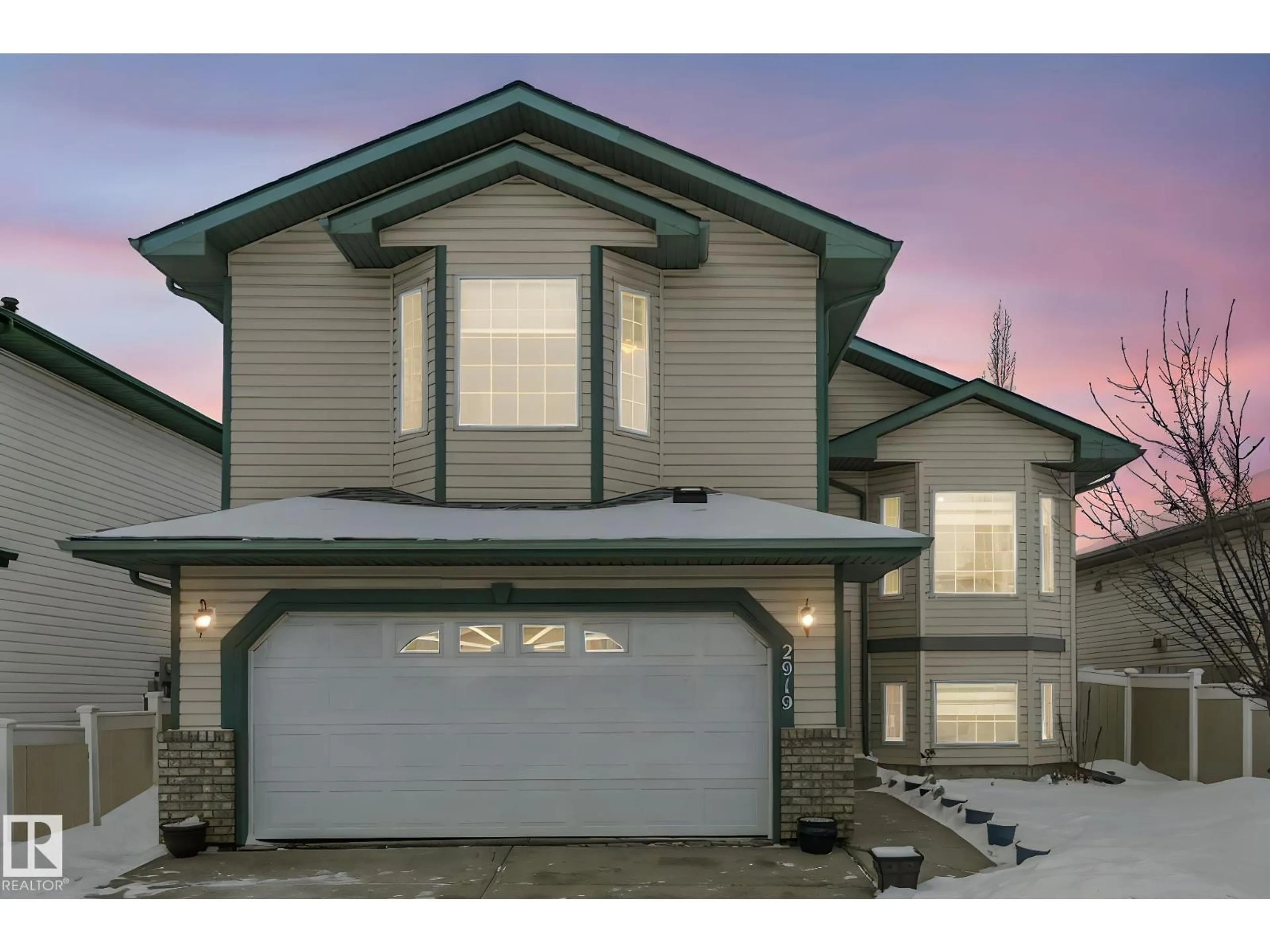 Home with vinyl exterior material, street for 2919 151A AV, Edmonton Alberta T5Y2Y5