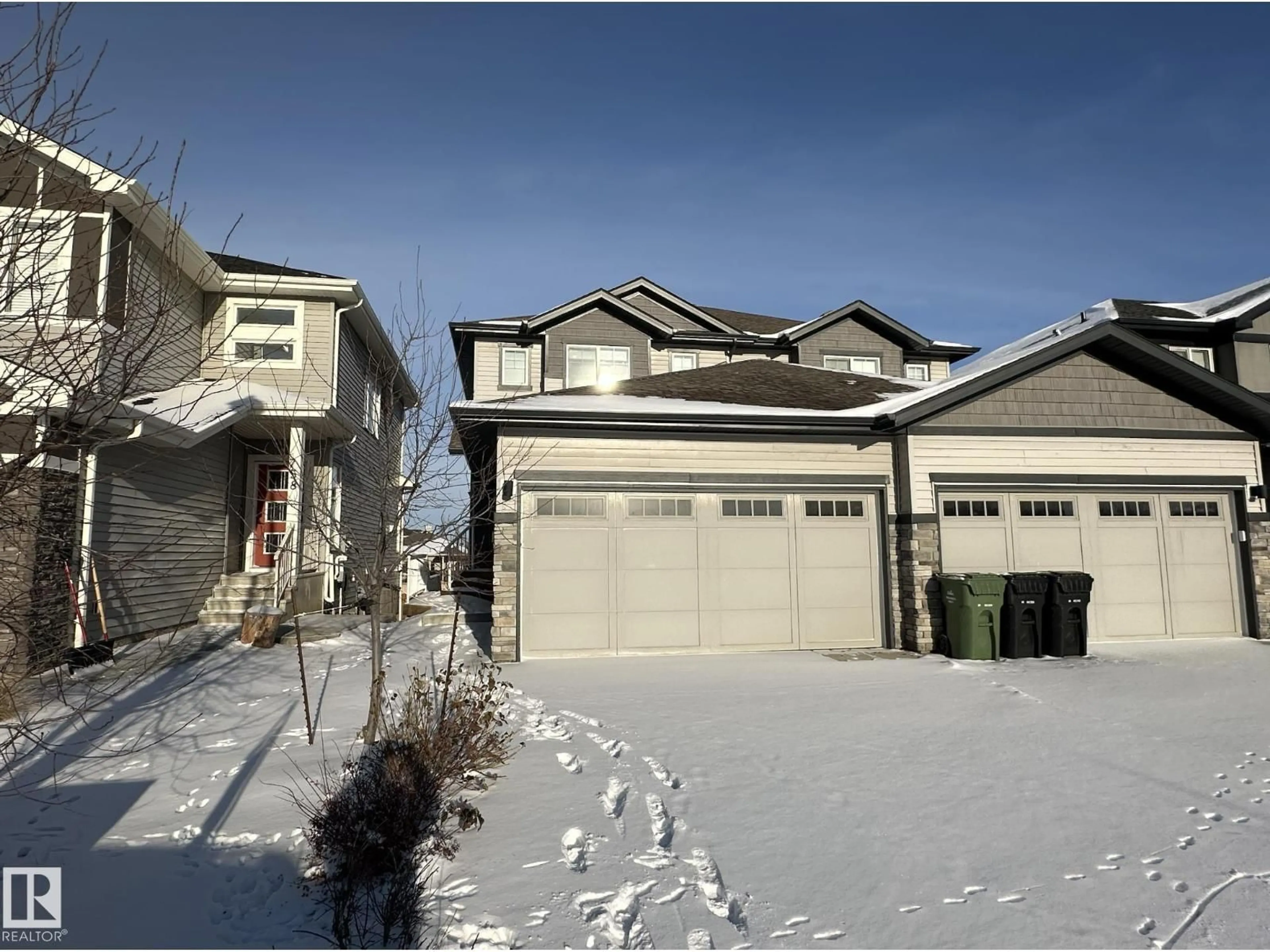 Home with vinyl exterior material, street for 760 BERG LO, Leduc Alberta T9E1G8