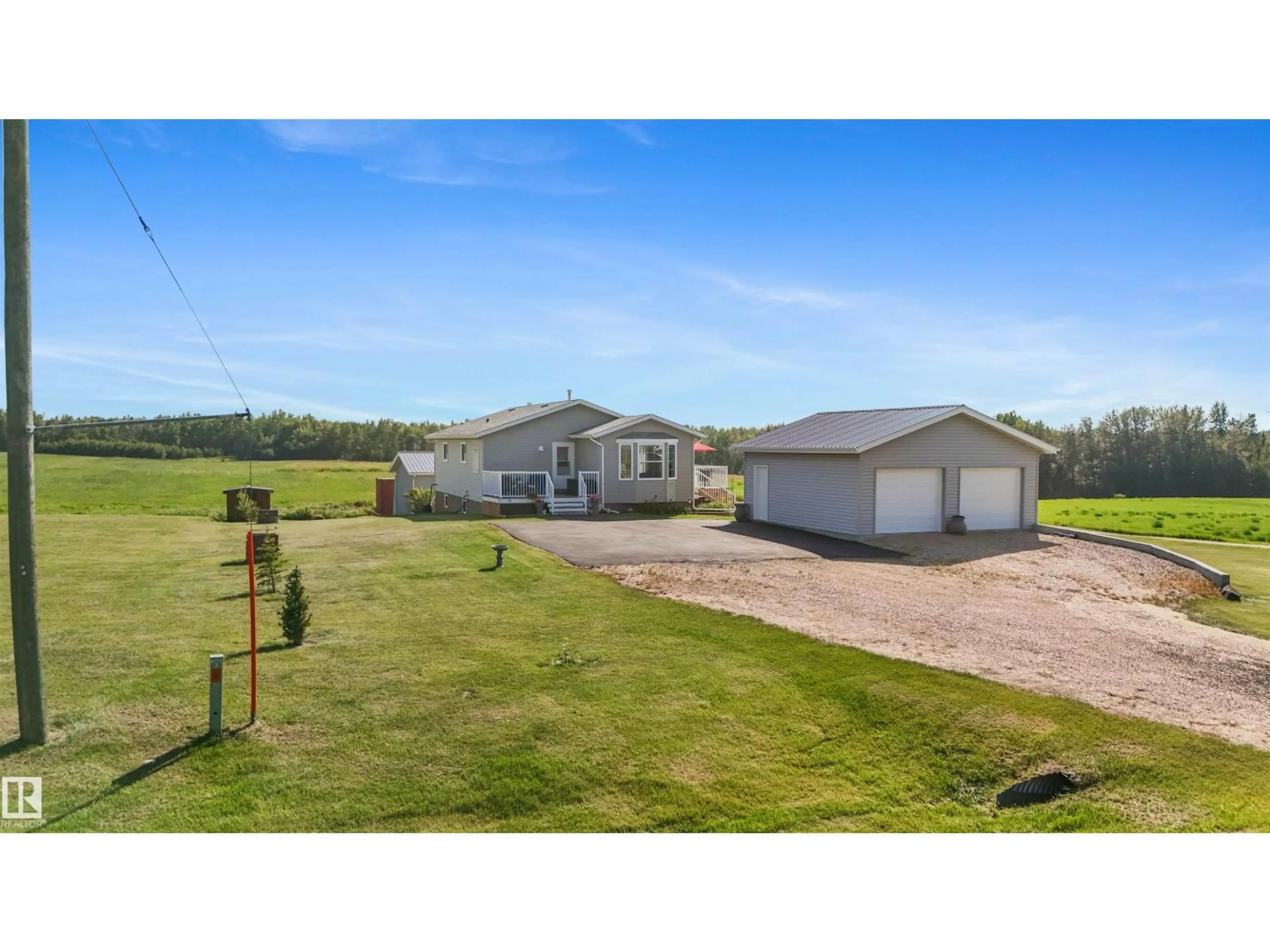 A pic from outside/outdoor area/front of a property/back of a property/a pic from drone, unknown for 5049 50A AV, Rural Brazeau County Alberta T0C1W0