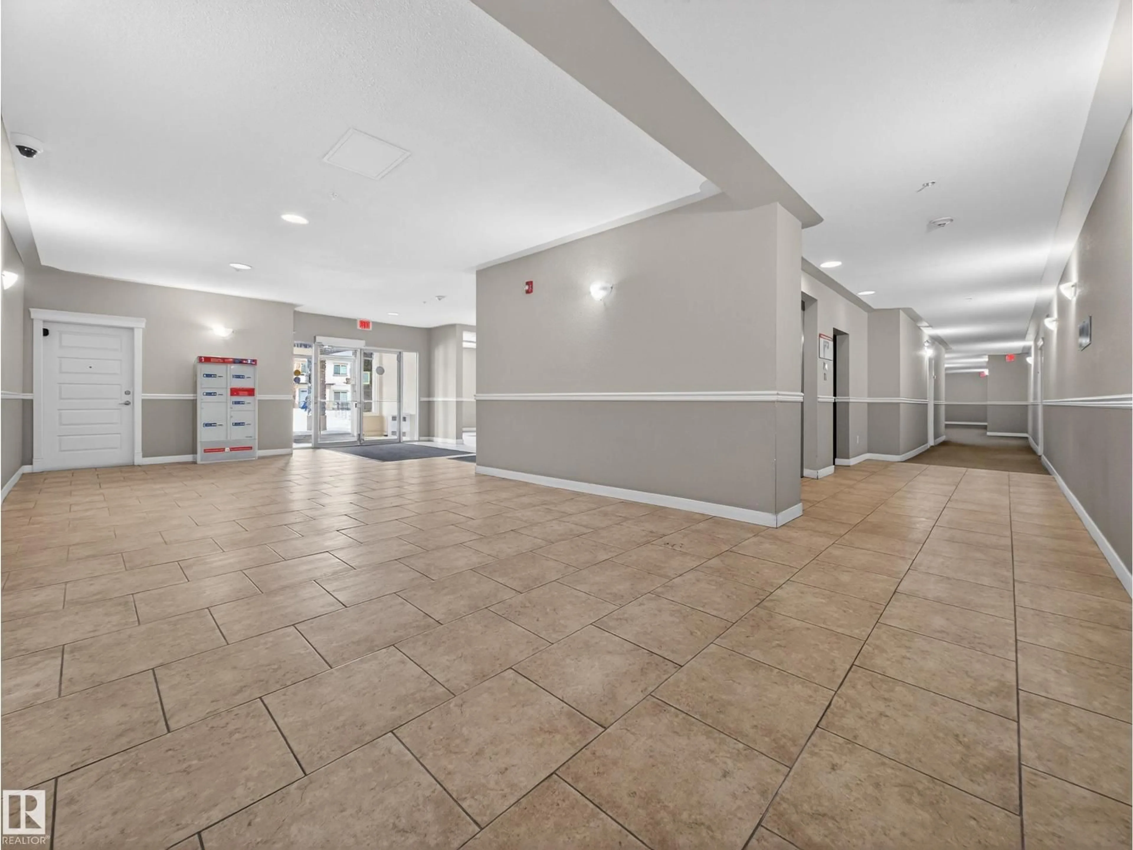 Indoor foyer for 113 10530 56 AV NW, Edmonton Alberta T6H0X7