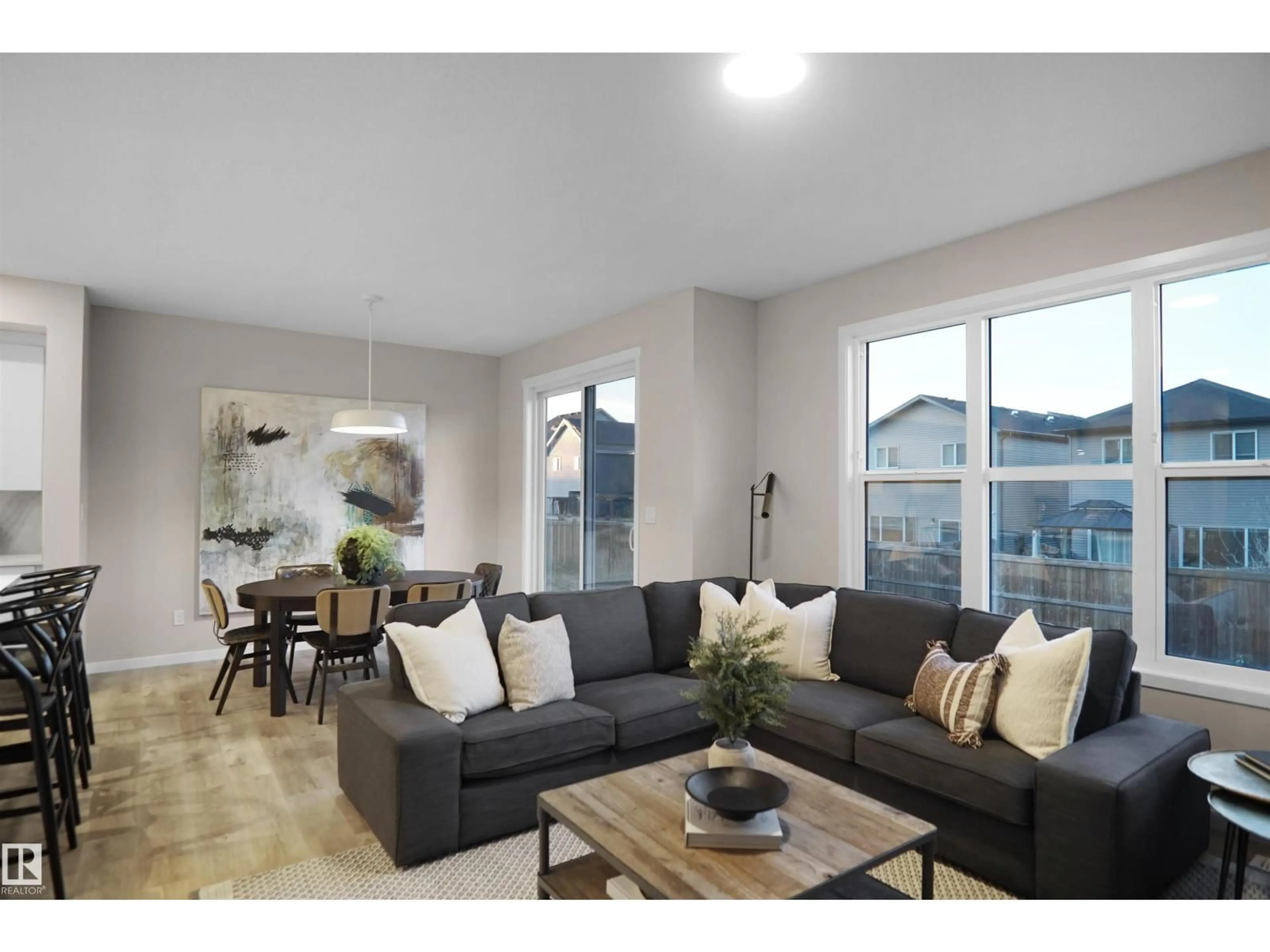 Living room with furniture, wood/laminate floor for 22910 95A AV, Edmonton Alberta T5T7A7