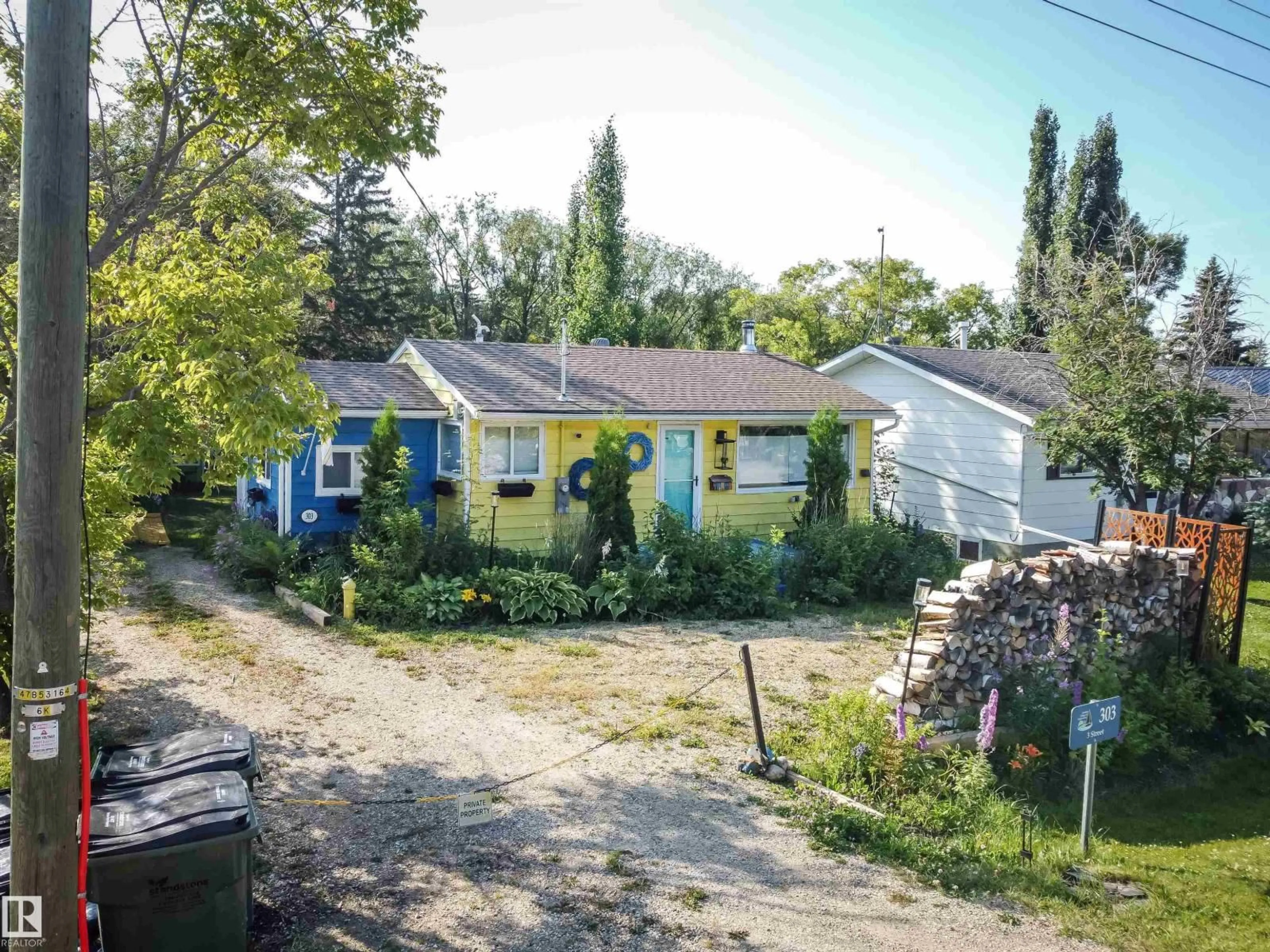 A pic from outside/outdoor area/front of a property/back of a property/a pic from drone, street for 303 3 ST, Rural Lac Ste. Anne County Alberta T0E1A0