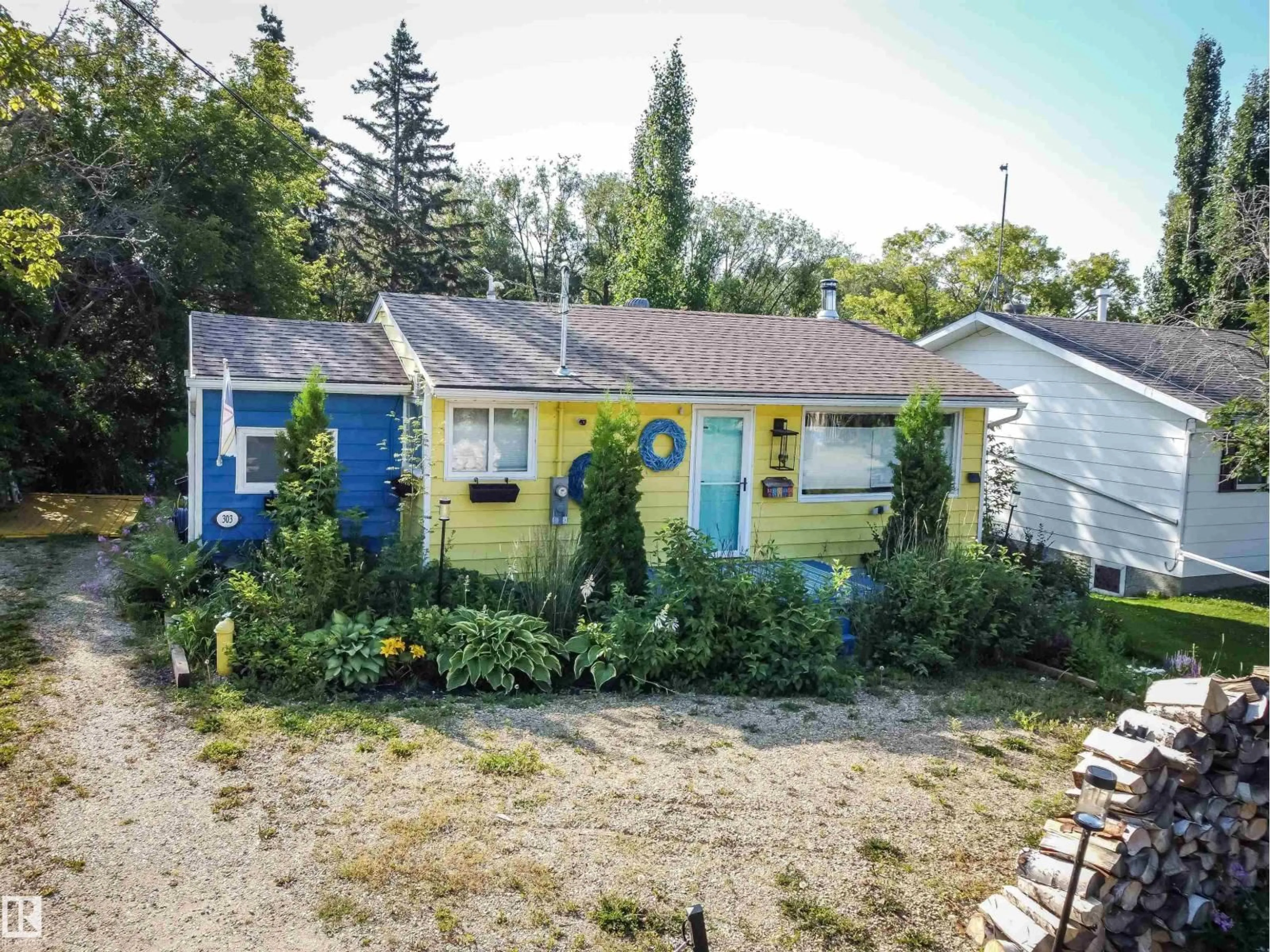 A pic from outside/outdoor area/front of a property/back of a property/a pic from drone, street for 303 3 ST, Rural Lac Ste. Anne County Alberta T0E1A0