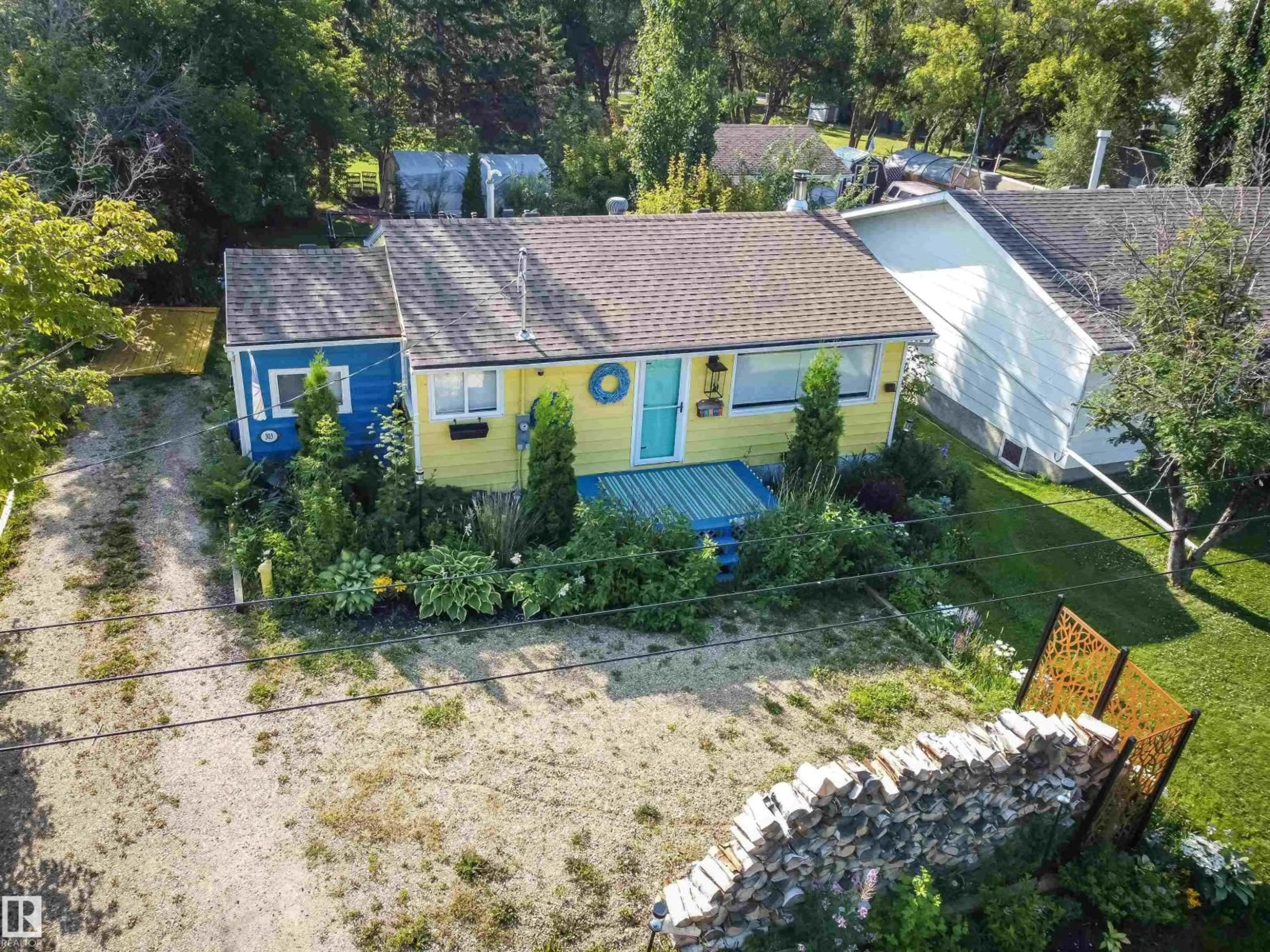 A pic from outside/outdoor area/front of a property/back of a property/a pic from drone, street for 303 3 ST, Rural Lac Ste. Anne County Alberta T0E1A0