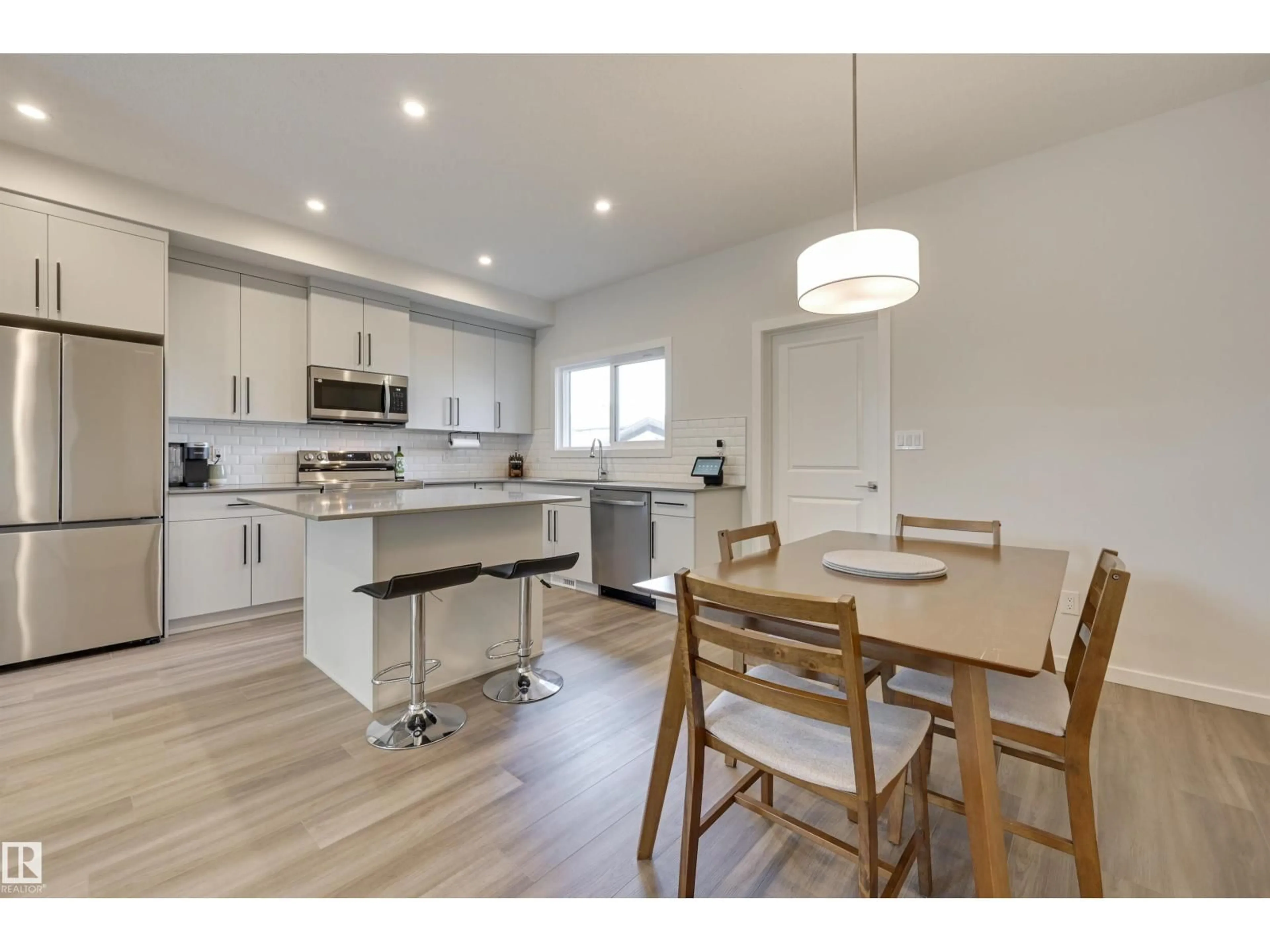 Open concept kitchen, wood/laminate floor for 163 CANTER WD, Sherwood Park Alberta T8H2Z4