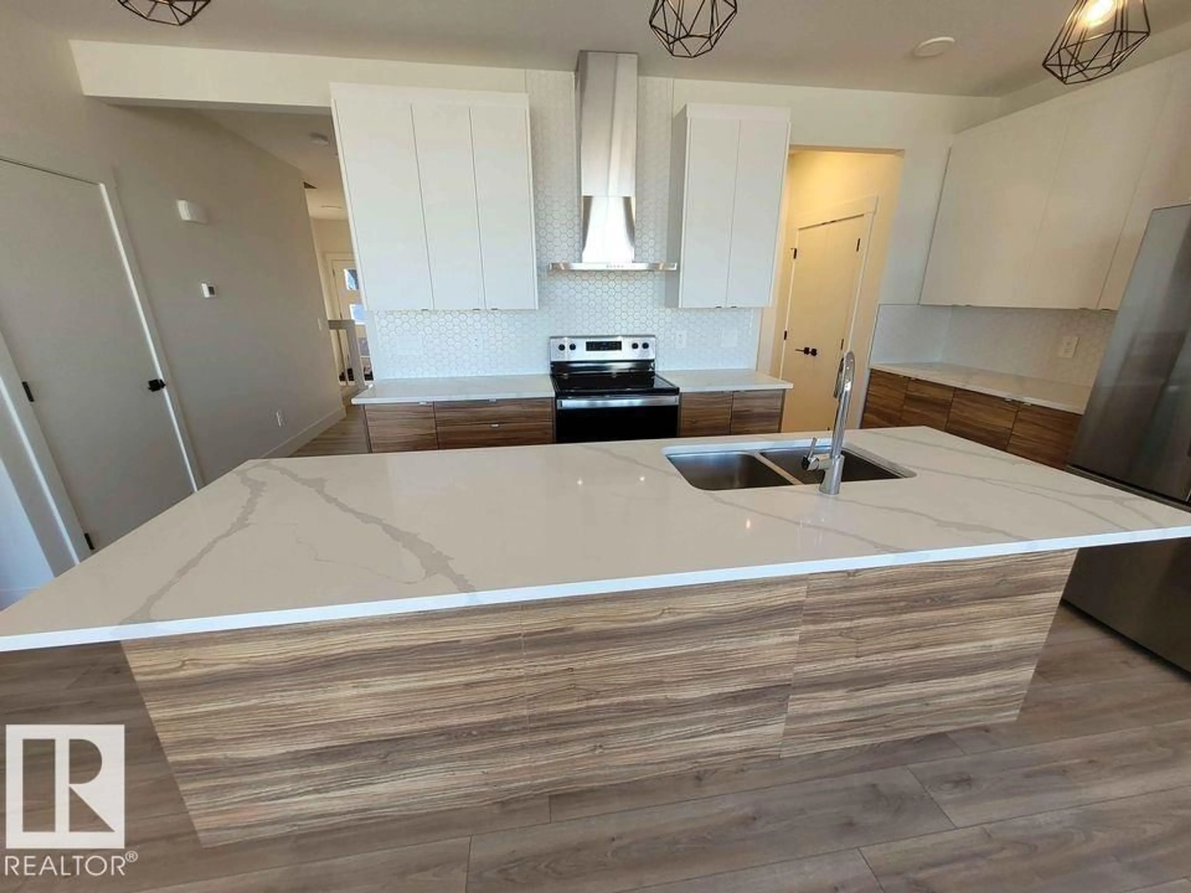 Open concept kitchen, unknown for 1009 GOLDFINCH WY, Edmonton Alberta T5S0P9