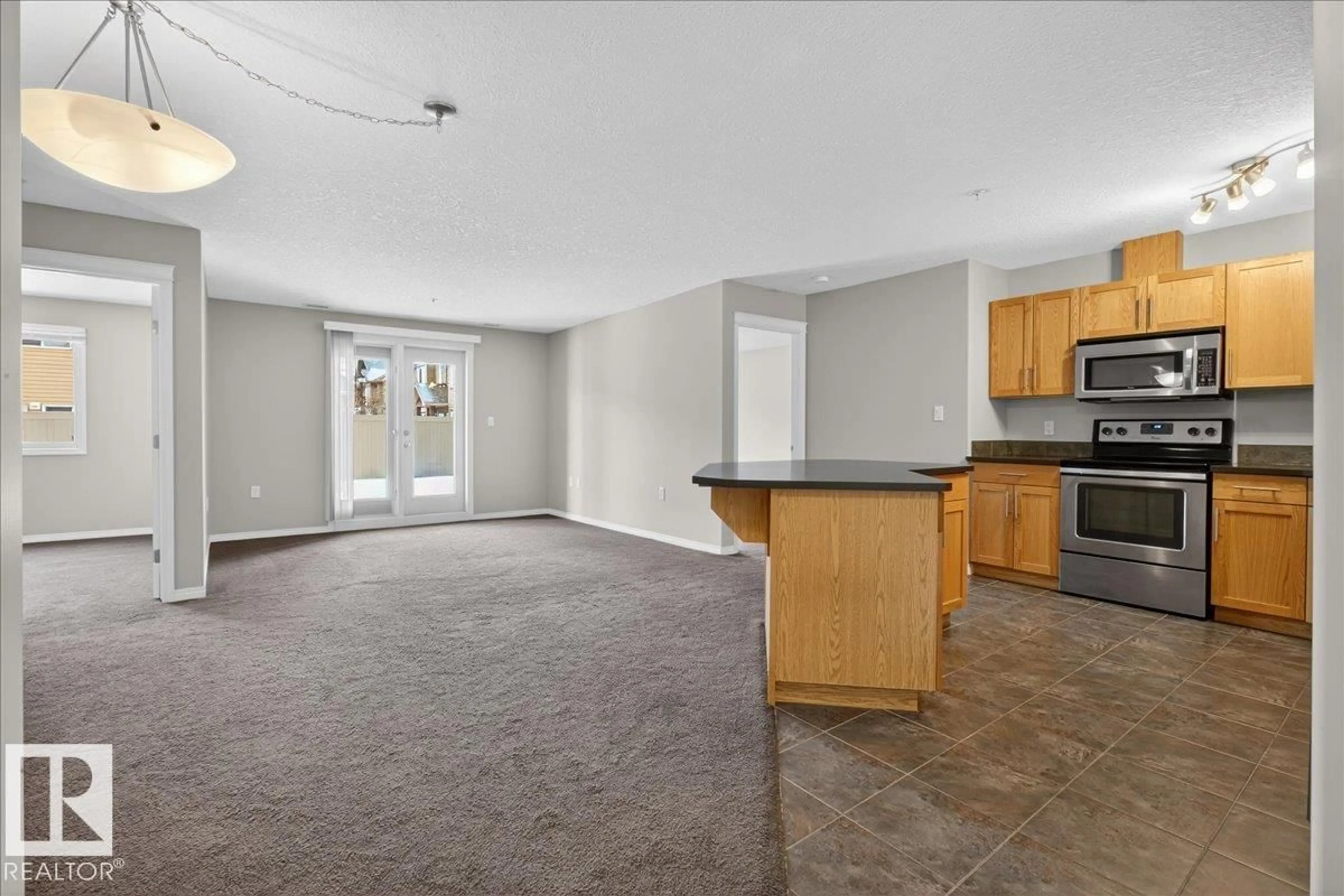 Open concept kitchen, unknown for 300 - 117 SPRUCE RIDGE RD, Spruce Grove Alberta T7X0H6
