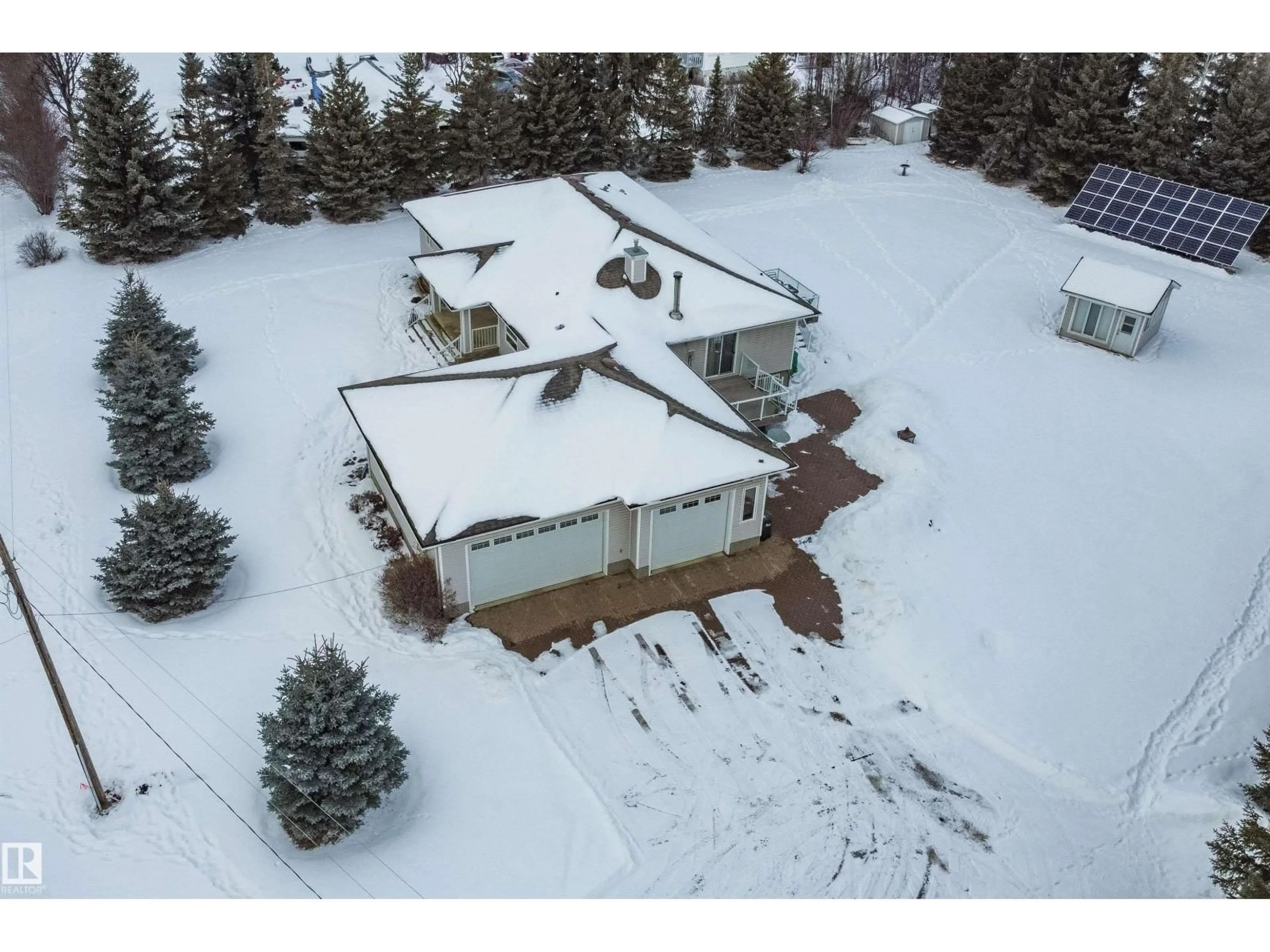A pic from outside/outdoor area/front of a property/back of a property/a pic from drone, mountain view for 62 53371 RGE ROAD 231, Rural Strathcona County Alberta T8A4V2