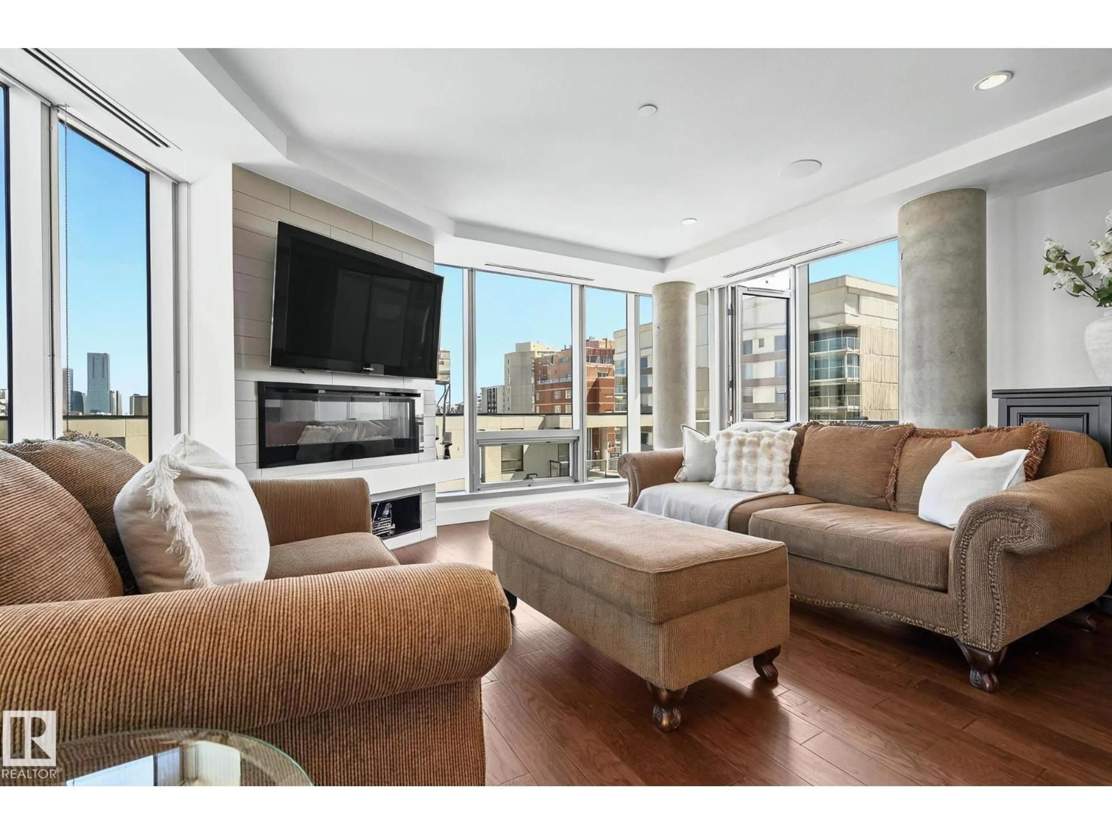 Living room with furniture, unknown for 1201 JASPER AV, Edmonton Alberta T5K0P1