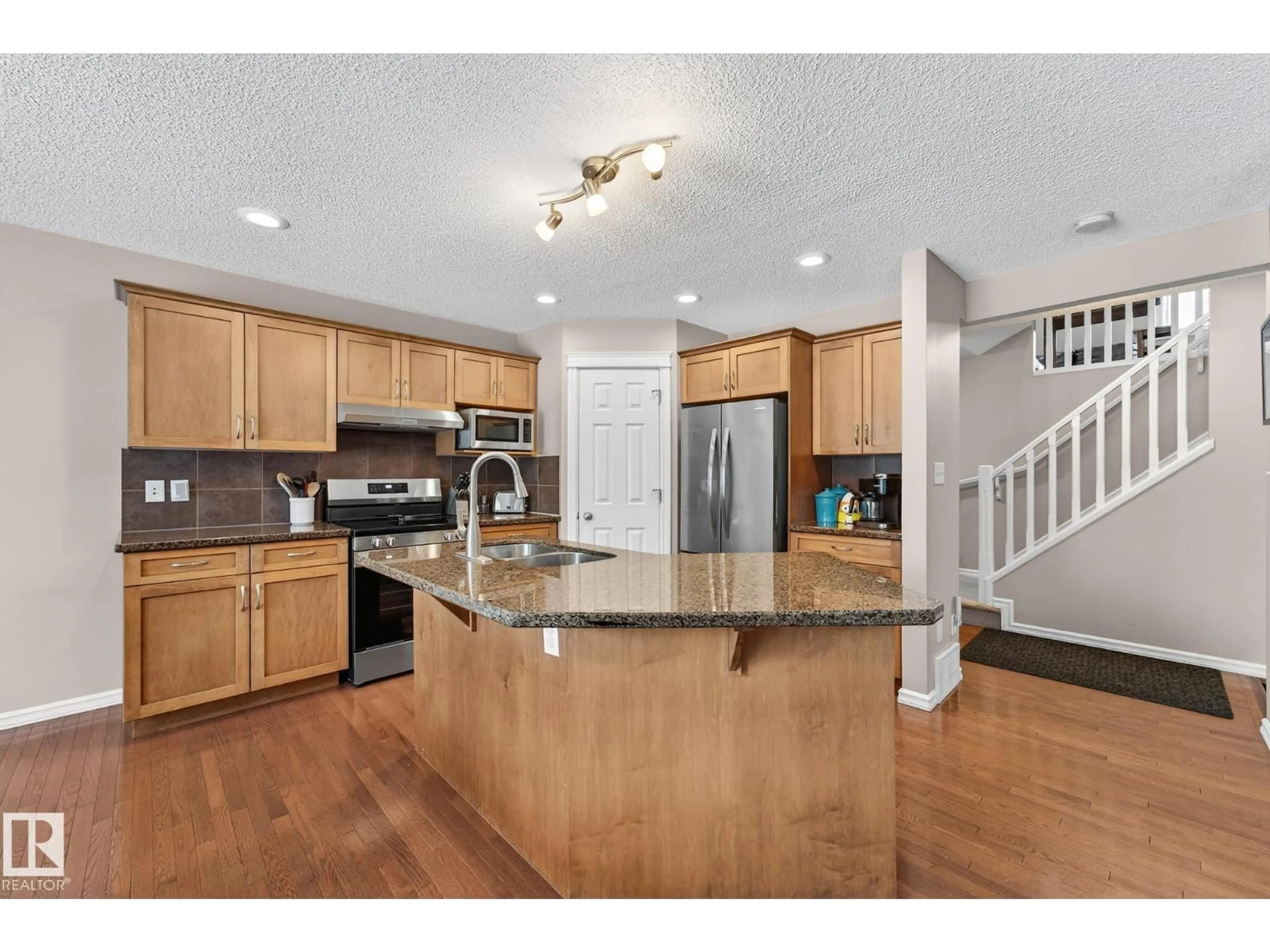 Open concept kitchen, unknown for 21907 95 AV, Edmonton Alberta T5T1N2