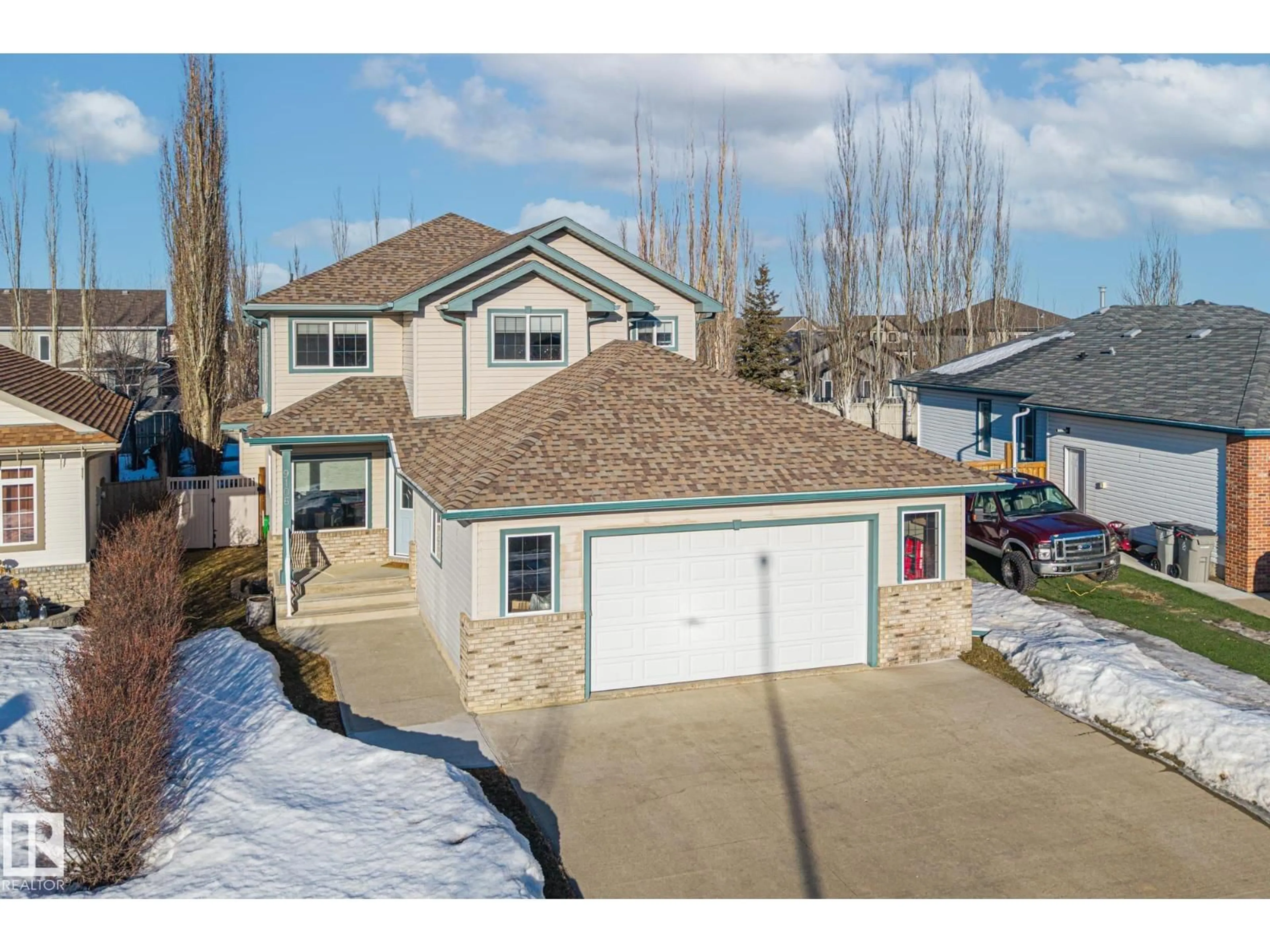 A pic from outside/outdoor area/front of a property/back of a property/a pic from drone, street for 9106 96 AV, Morinville Alberta T8R1T3