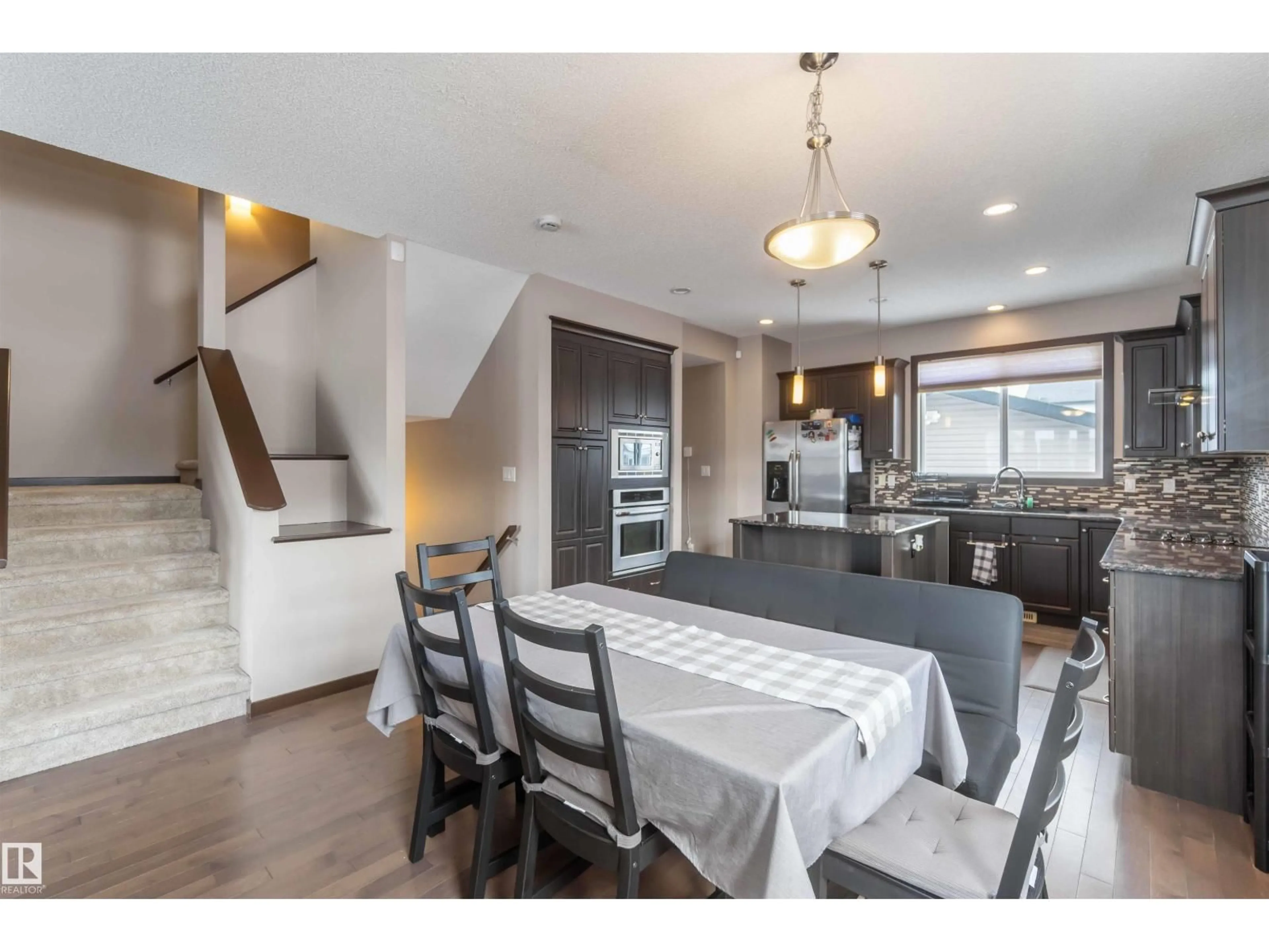 Open concept kitchen, unknown for NW - 9839 221 ST, Edmonton Alberta T5T4M3