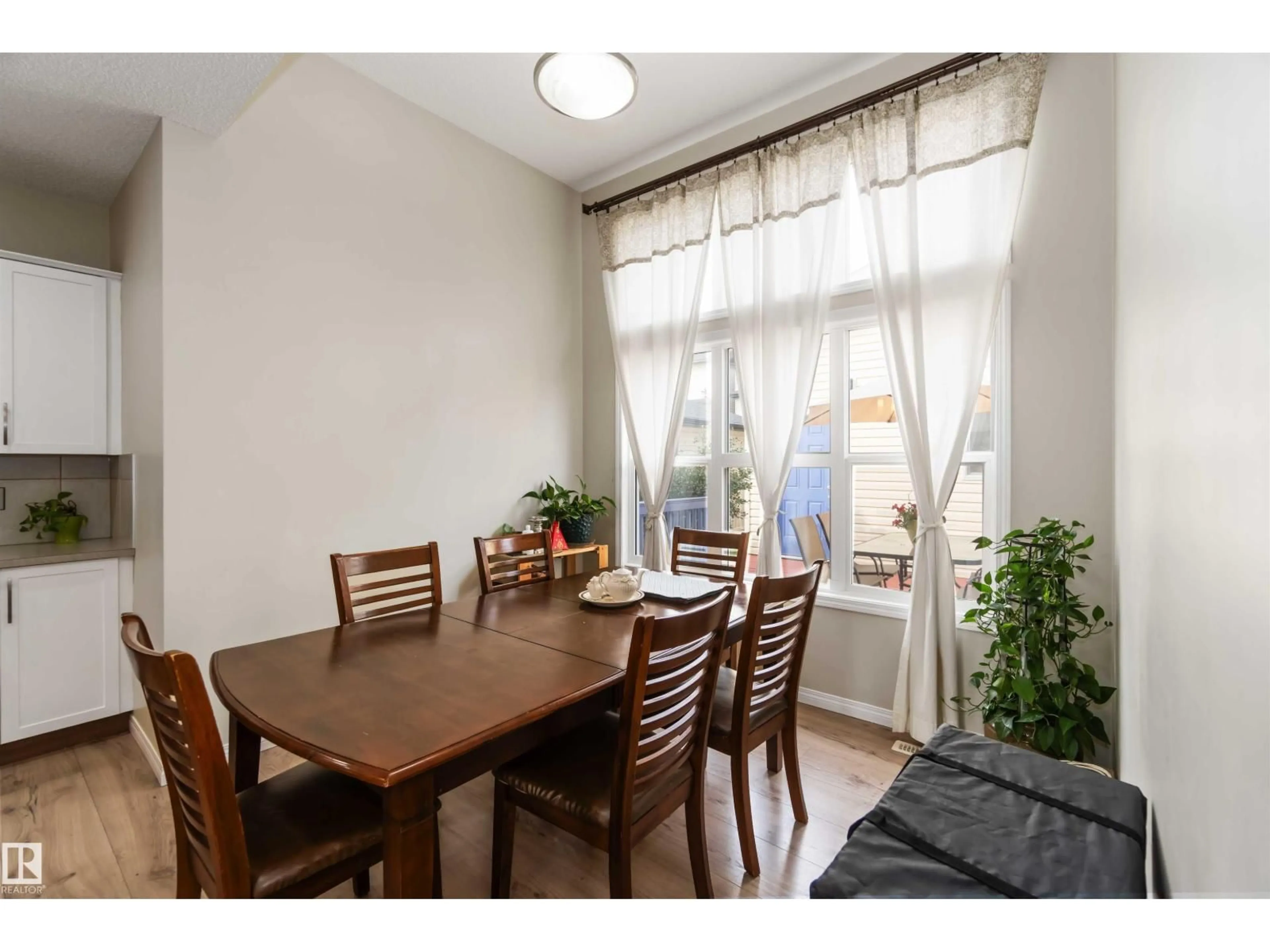 Dining room, wood/laminate floor for NW - 9932 221 ST, Edmonton Alberta T5T4M7