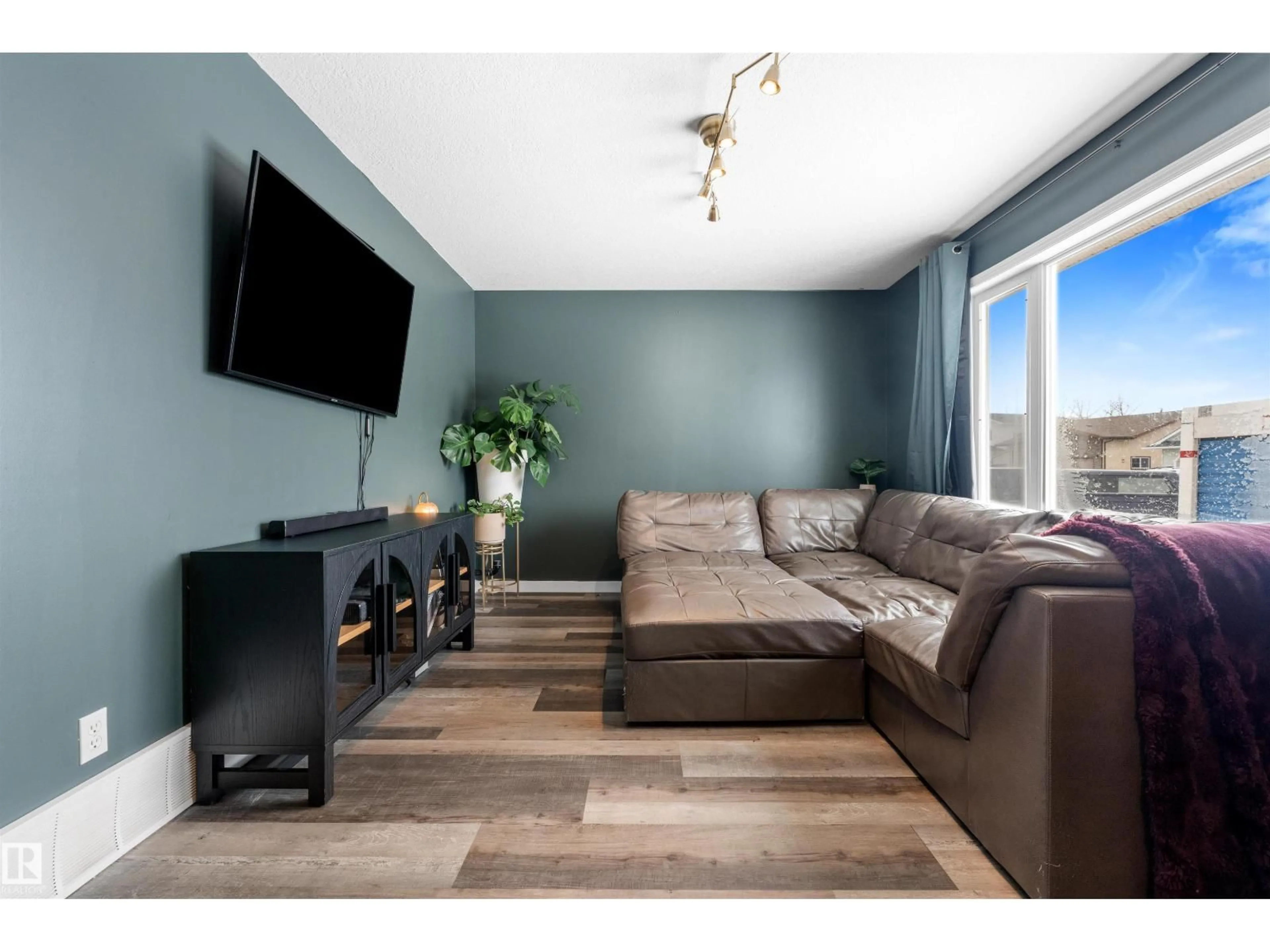 Living room with furniture, wood/laminate floor for 5316 65 ST, Redwater Alberta T0A2W0