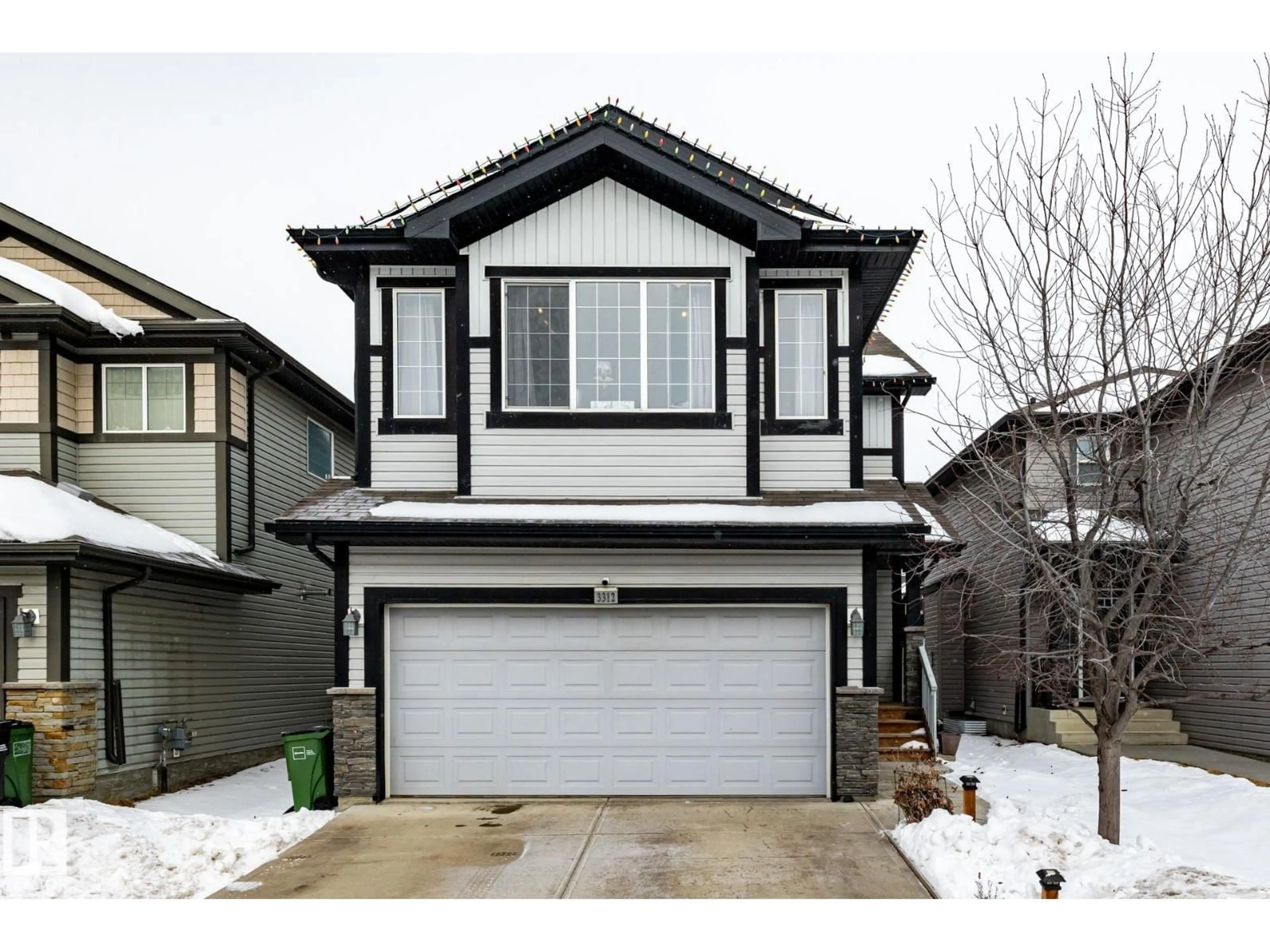 Home with vinyl exterior material, street for 3312 17B AV, Edmonton Alberta T6T0P3