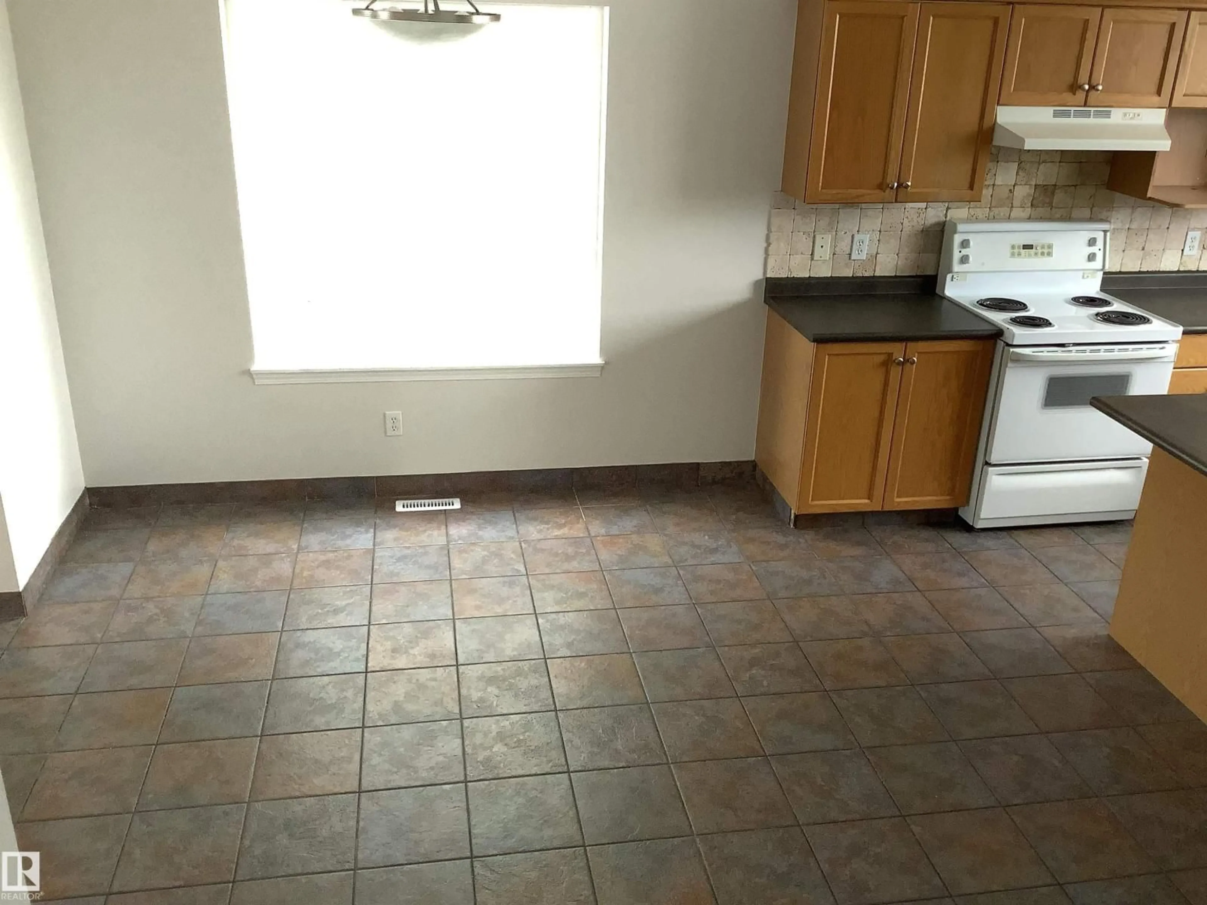 Standard kitchen, ceramic/tile floor for NW - 15007 136 ST, Edmonton Alberta T6V1N2
