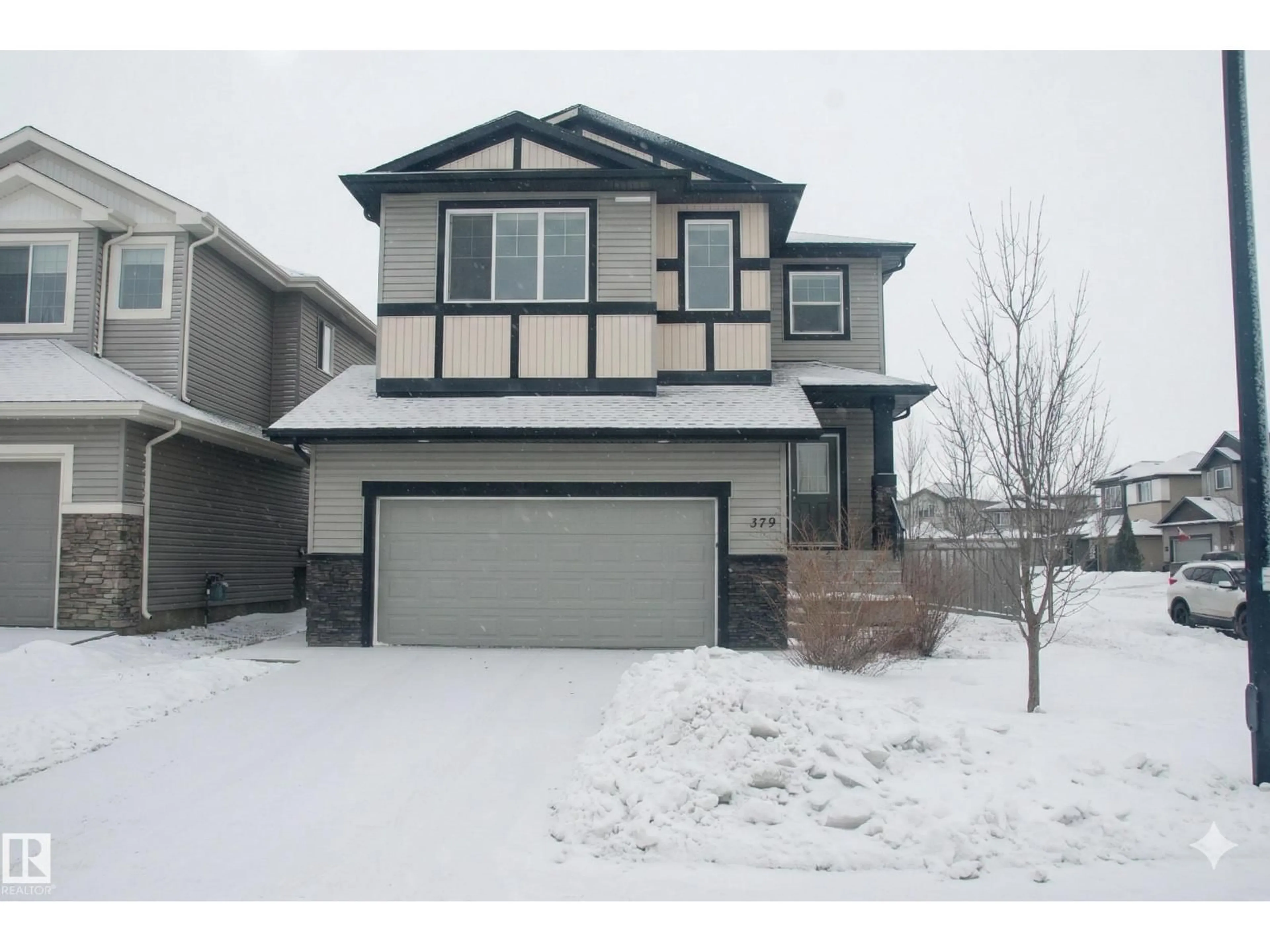 Home with vinyl exterior material, street for 379 REYNALDS CO, Leduc Alberta T9E0T2