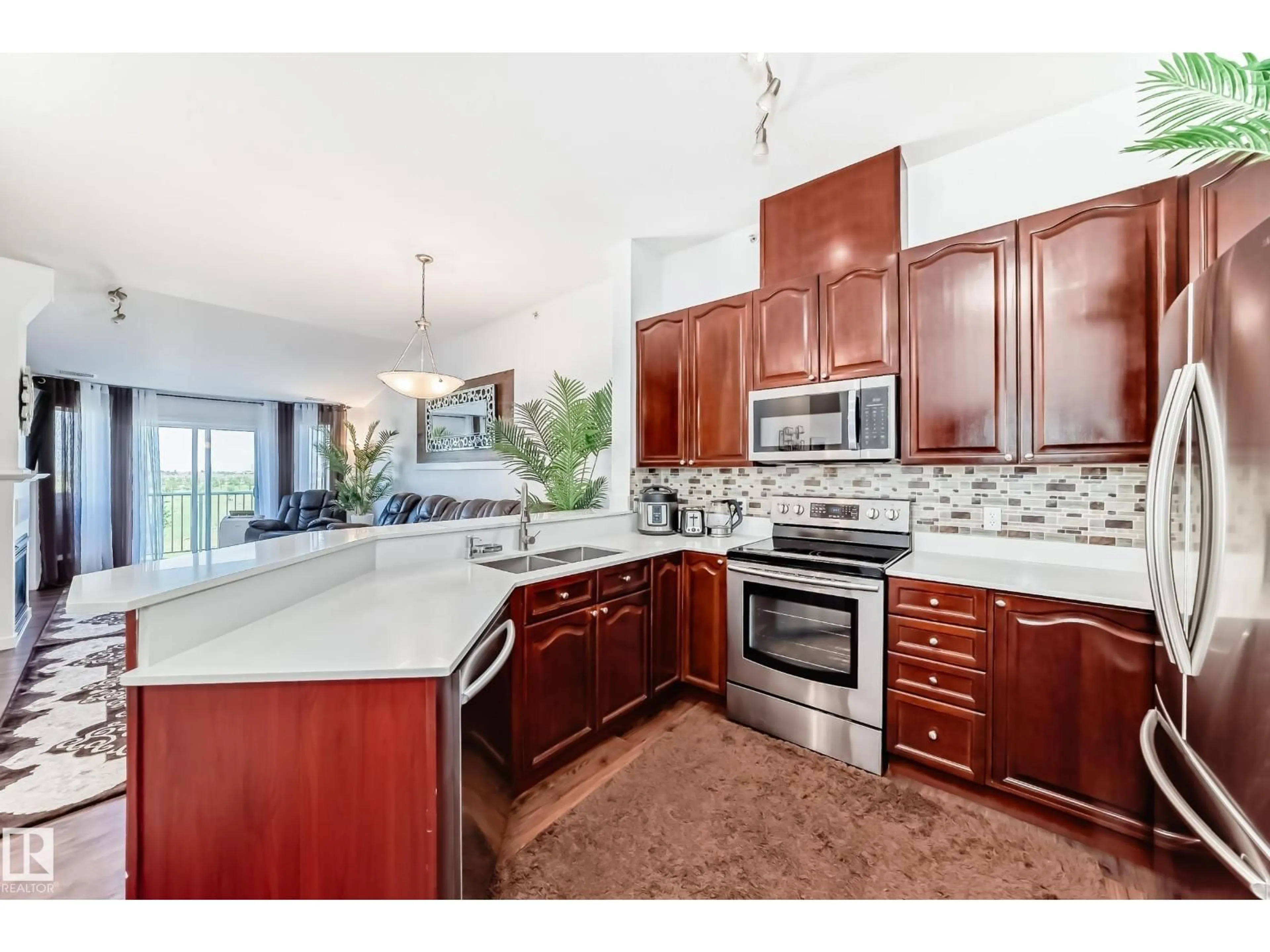 Open concept kitchen, ceramic/tile floor for #412 - 4312 139 AV, Edmonton Alberta T5Y3J4