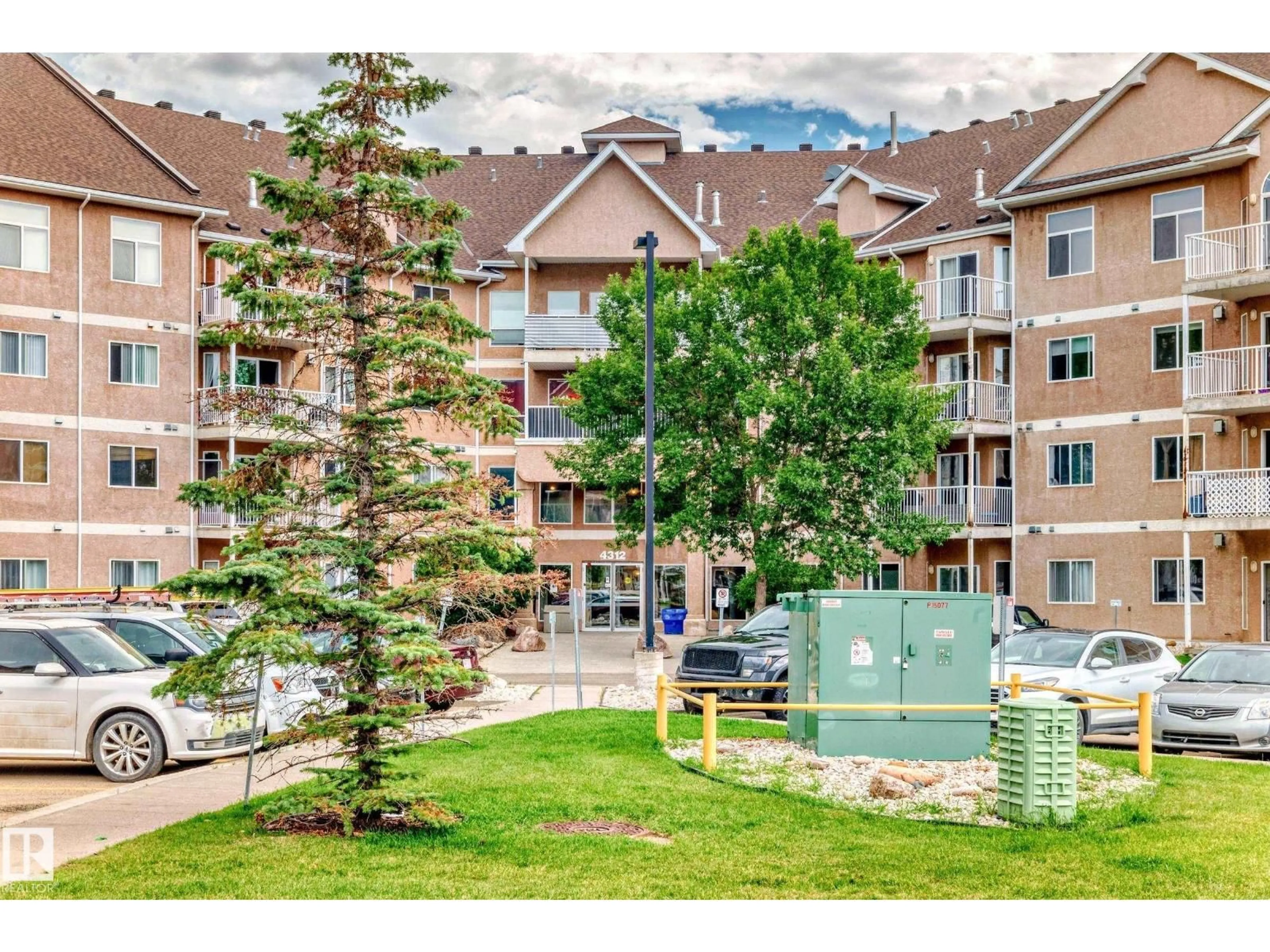 A pic from outside/outdoor area/front of a property/back of a property/a pic from drone, mountain view for #424 - 4312 139 AV, Edmonton Alberta T5Y3J4