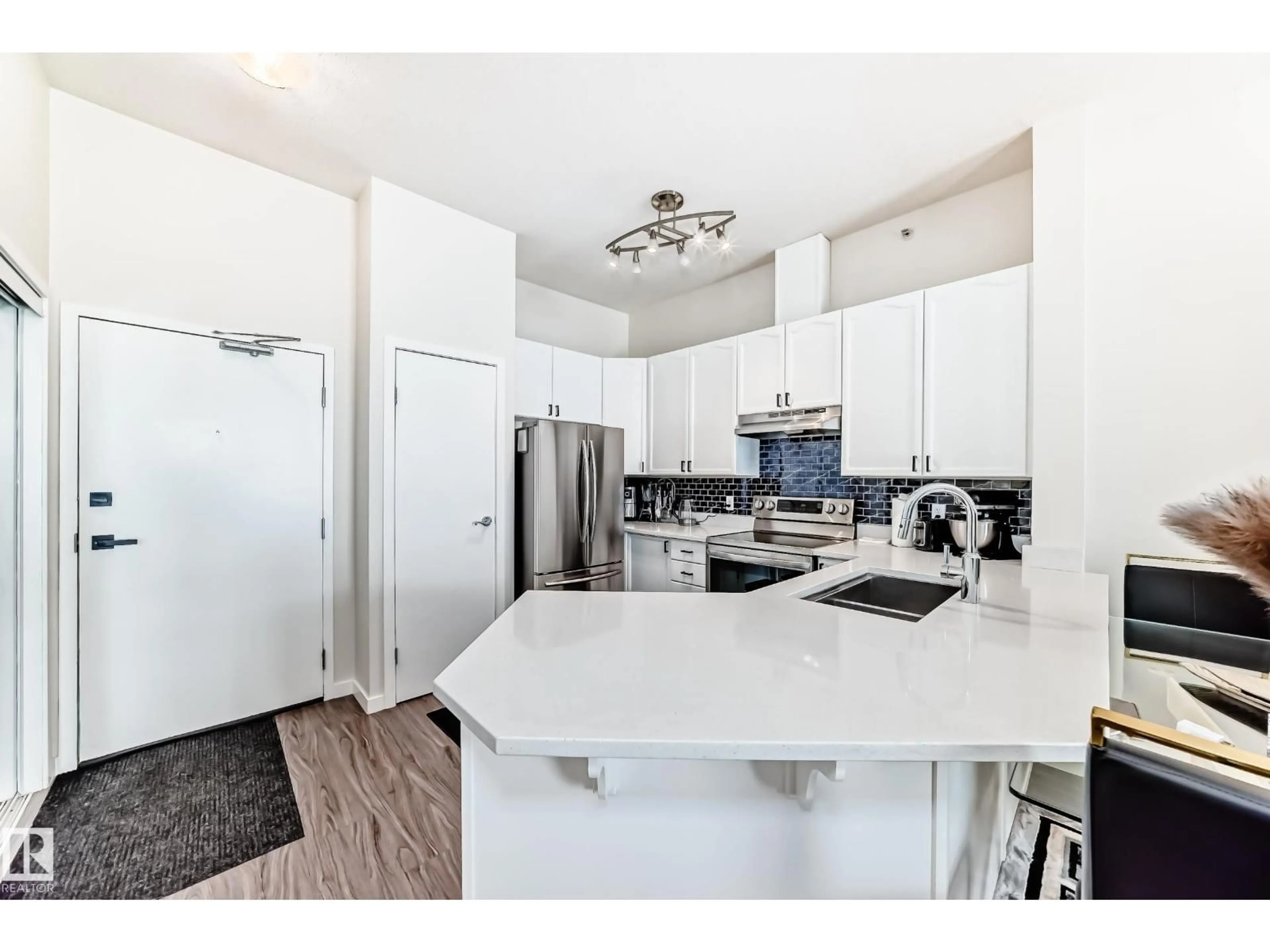 Open concept kitchen, unknown for #424 - 4312 139 AV, Edmonton Alberta T5Y3J4