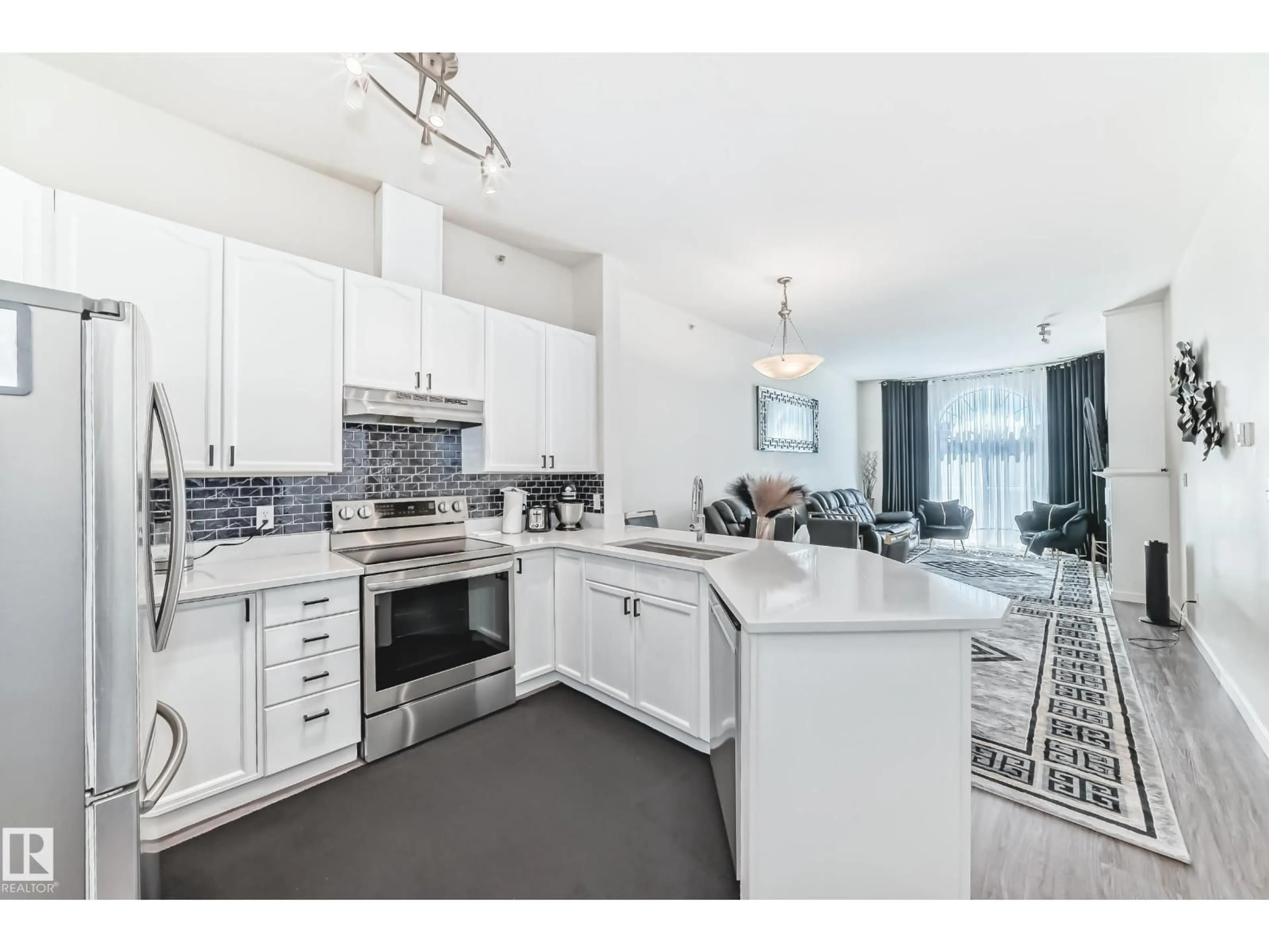Open concept kitchen, ceramic/tile floor for #424 - 4312 139 AV, Edmonton Alberta T5Y3J4