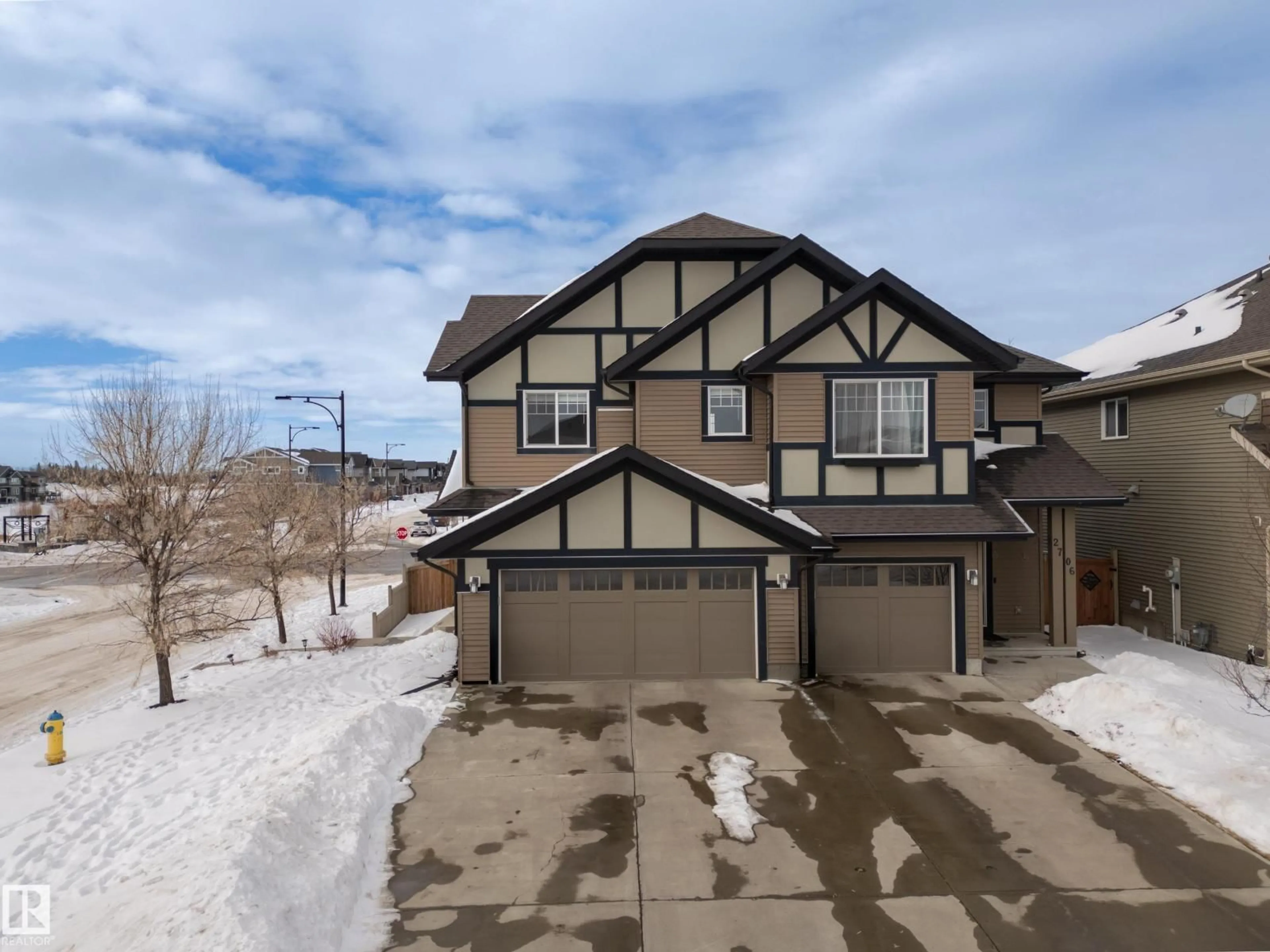 A pic from outside/outdoor area/front of a property/back of a property/a pic from drone, street for SW - 2704 COUGHLAN GR, Edmonton Alberta T6W3N8