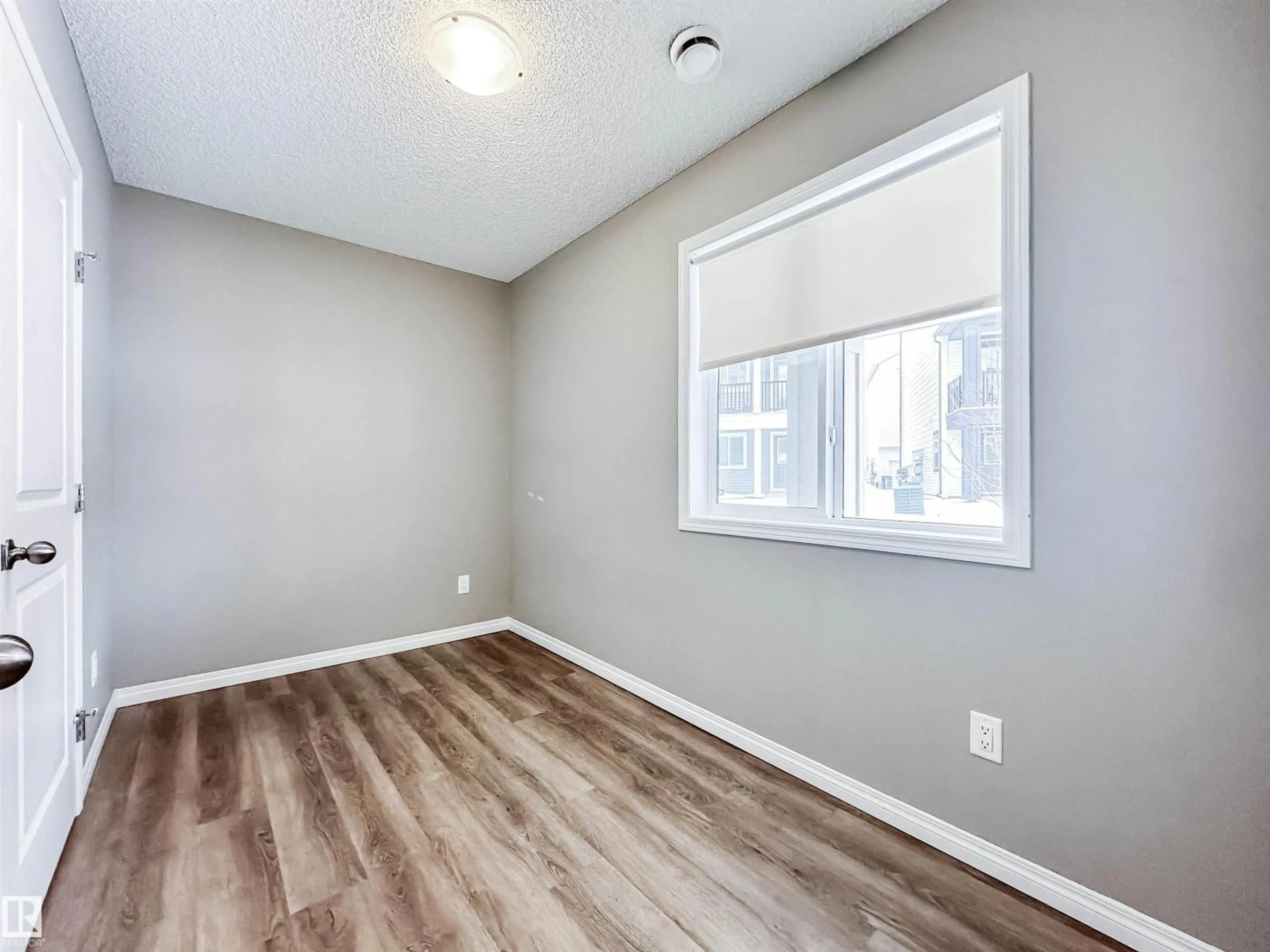 A pic of a room for #100 - 2072 WONNACOTT WY, Edmonton Alberta T6X2V7