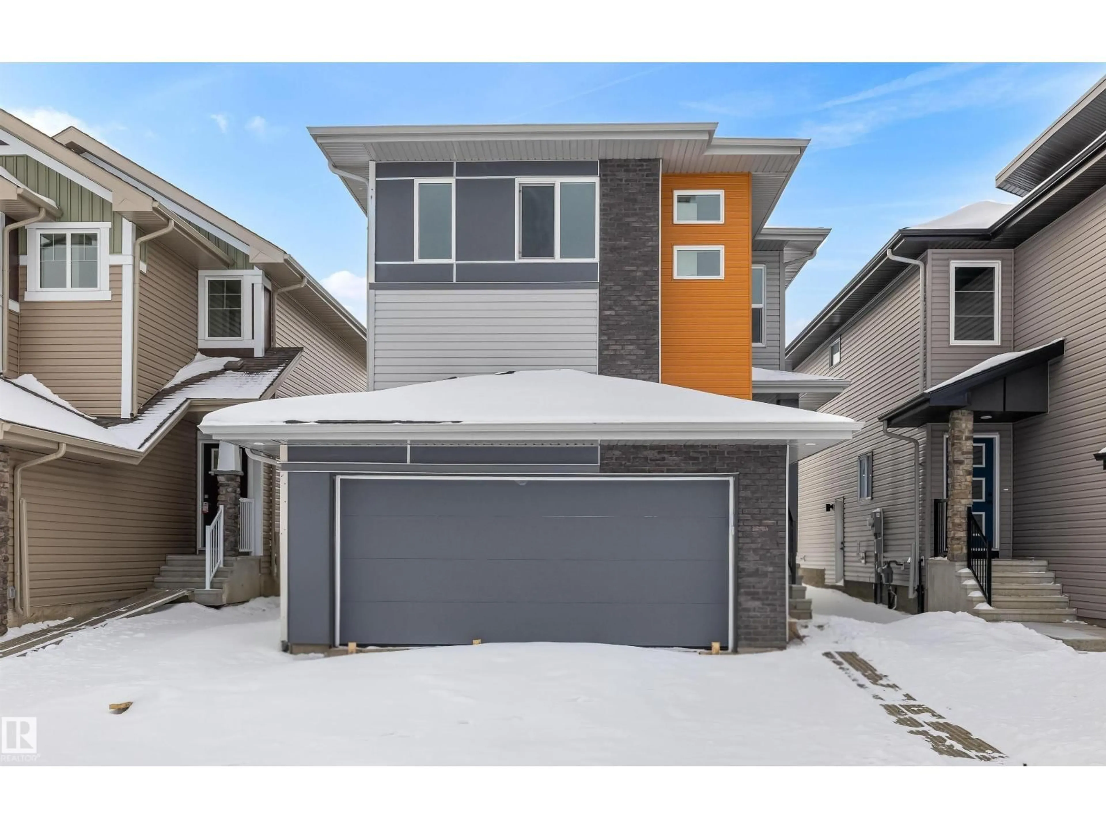 Home with vinyl exterior material, street for NW - 2816 190 ST, Edmonton Alberta T6M3H8