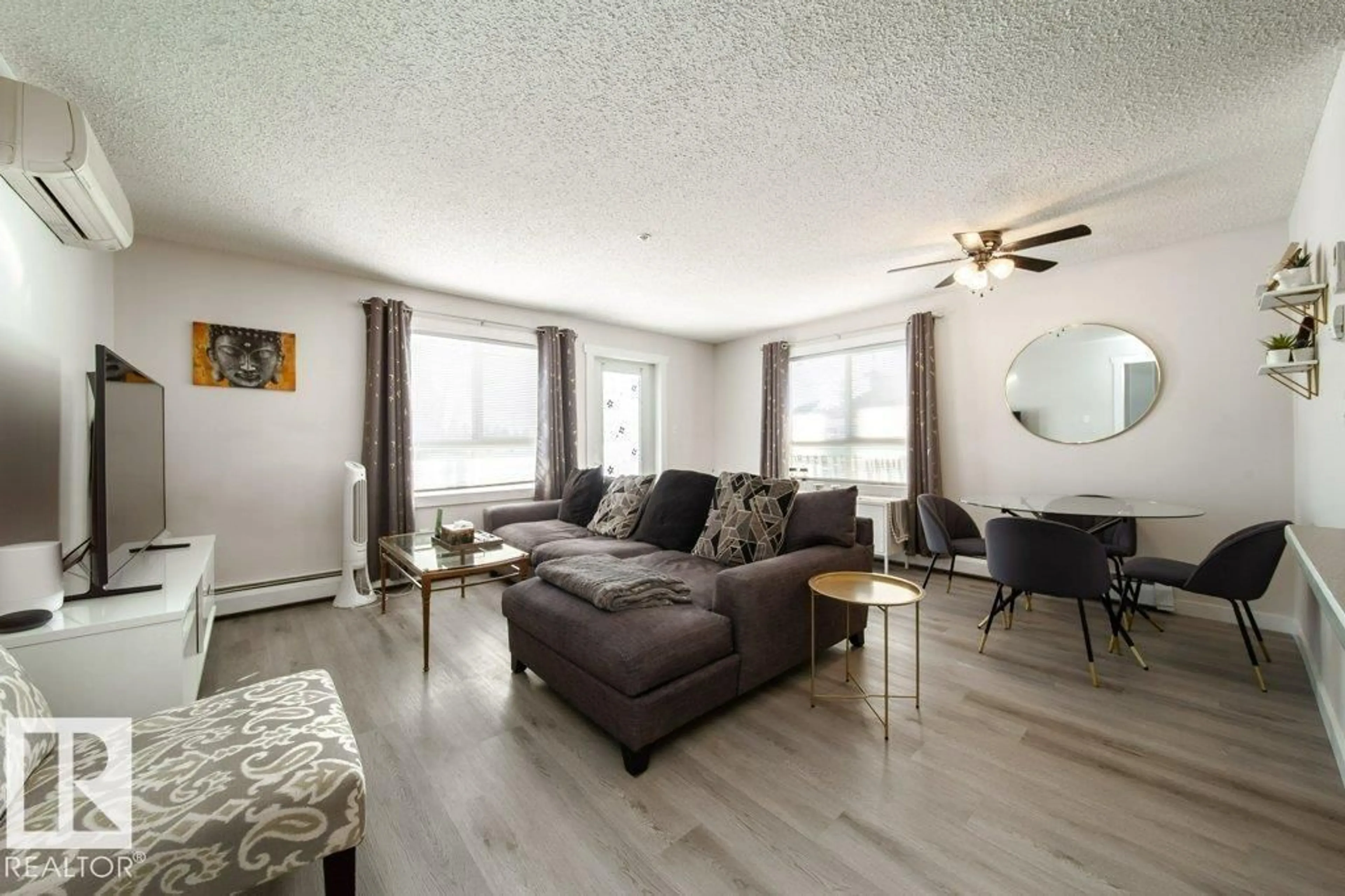 Living room with furniture, wood/laminate floor for #114 - 5340 199 ST, Edmonton Alberta T6M0A5