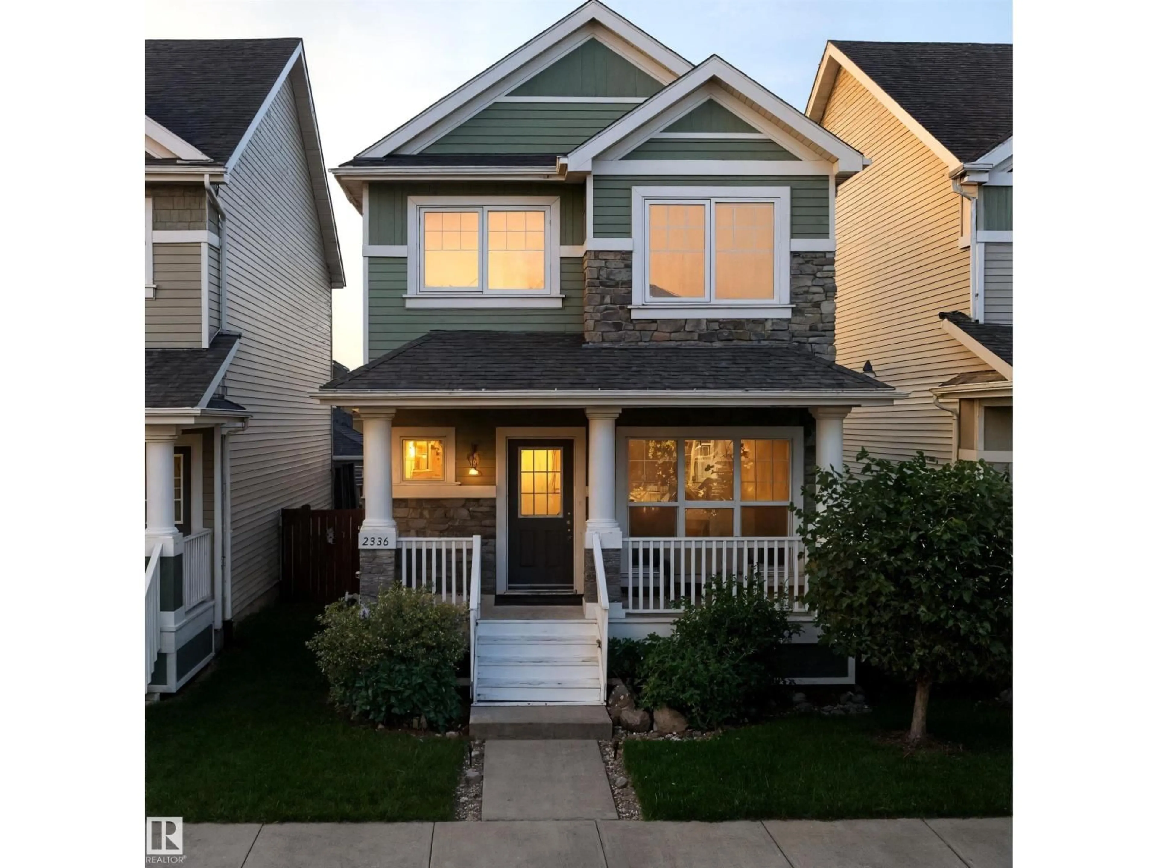 Home with vinyl exterior material, street for SW - 2336 70 ST, Edmonton Alberta T6X1Z2