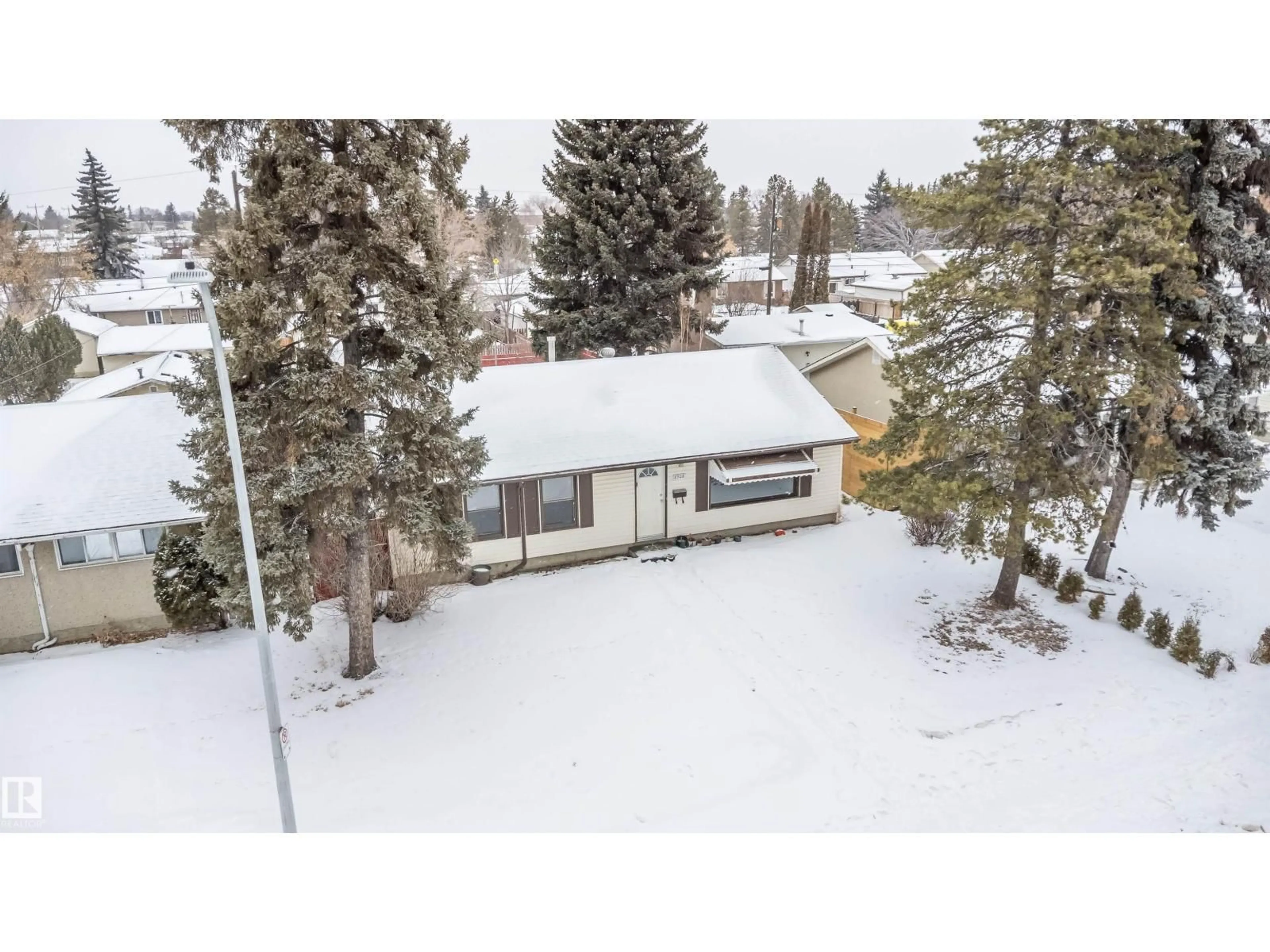 A pic from outside/outdoor area/front of a property/back of a property/a pic from drone, unknown for NW - 8908 130 AV, Edmonton Alberta T5E0R9