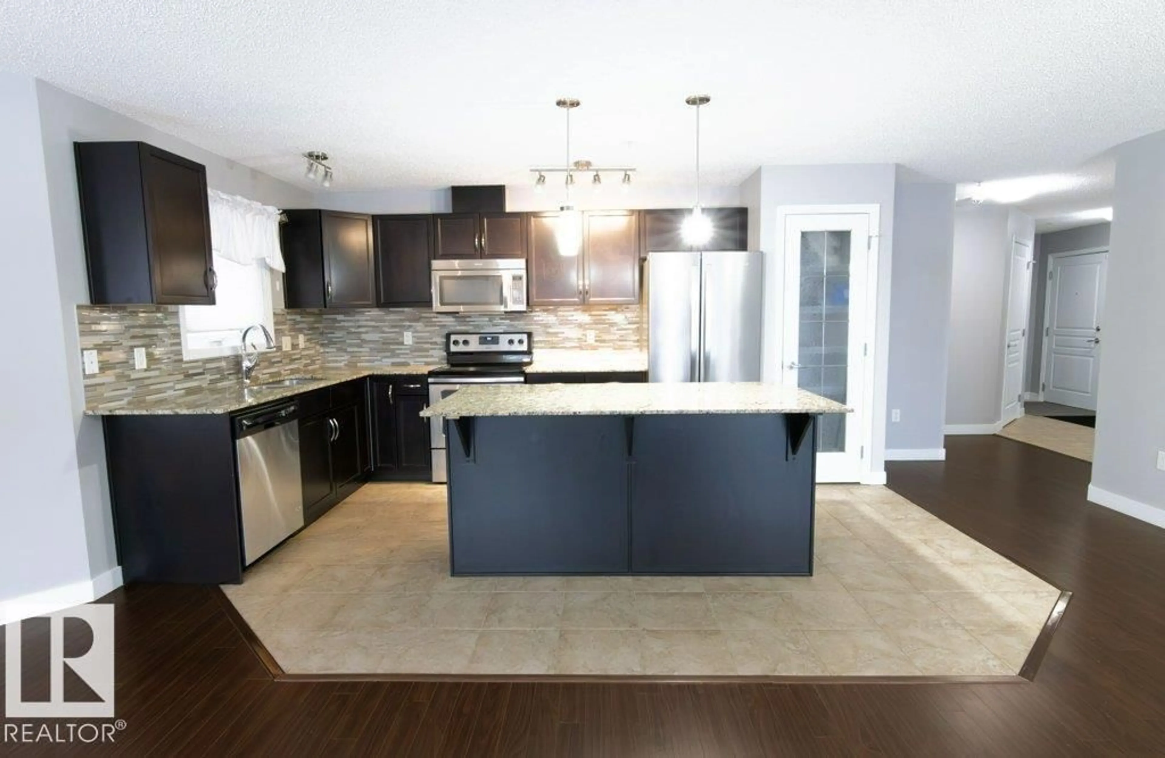 Open concept kitchen, unknown for #107 - 2045 GRANTHAM CT, Edmonton Alberta T5T3X6