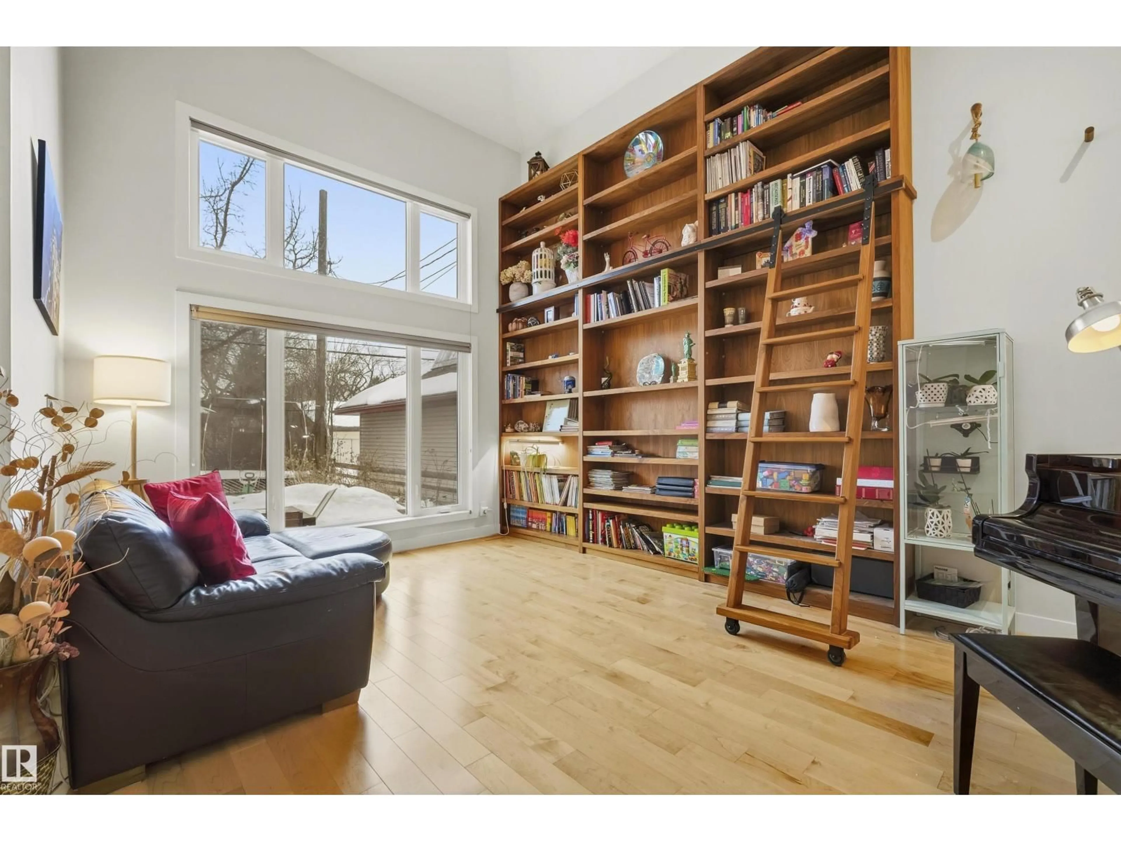 Living room with furniture, wood/laminate floor for NW - 9324 95 ST, Edmonton Alberta T6C3X2