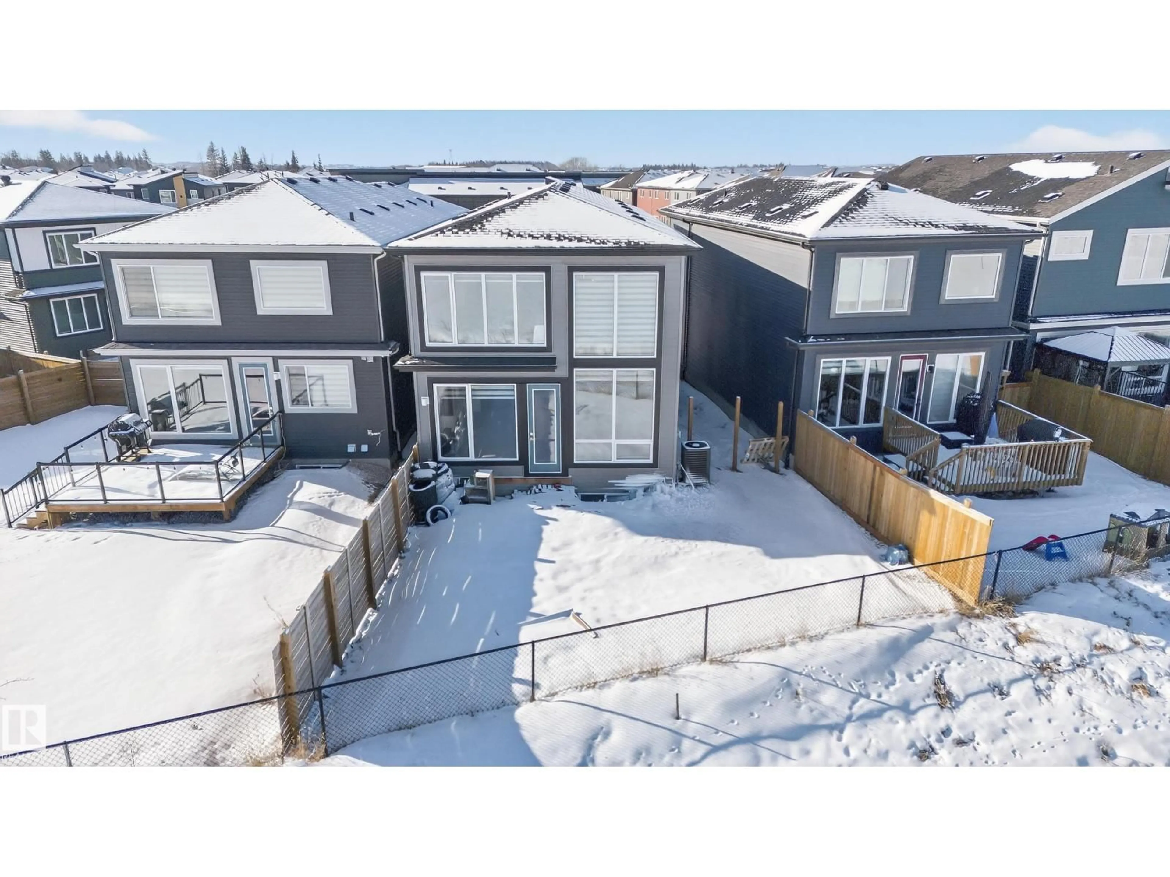 A pic from outside/outdoor area/front of a property/back of a property/a pic from drone, mountain view for SW - 9194 PEAR DRIVE, Edmonton Alberta T6X2Z4