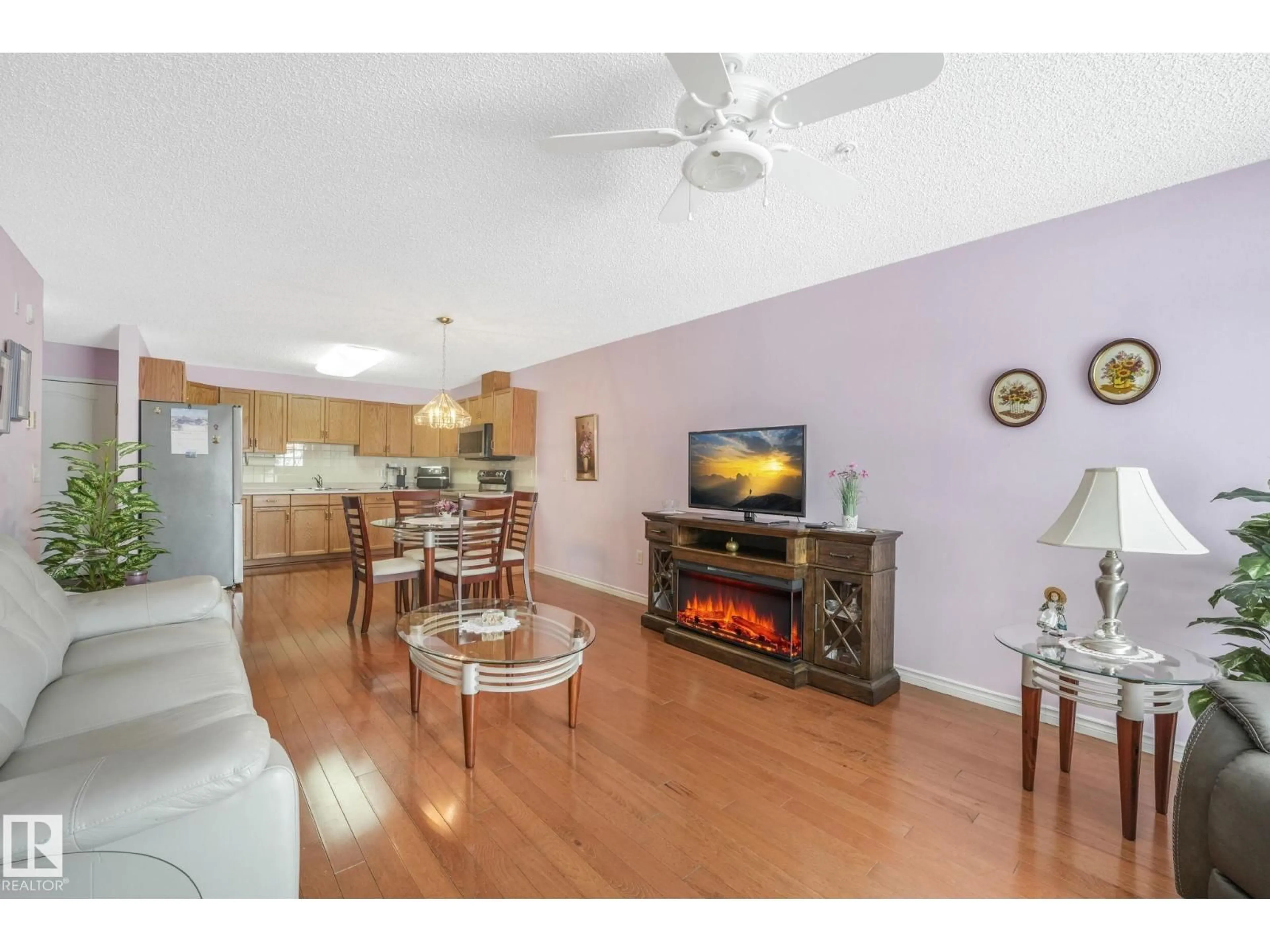 Living room with furniture, wood/laminate floor for #229 - 2741 55 ST, Edmonton Alberta T6L7G7