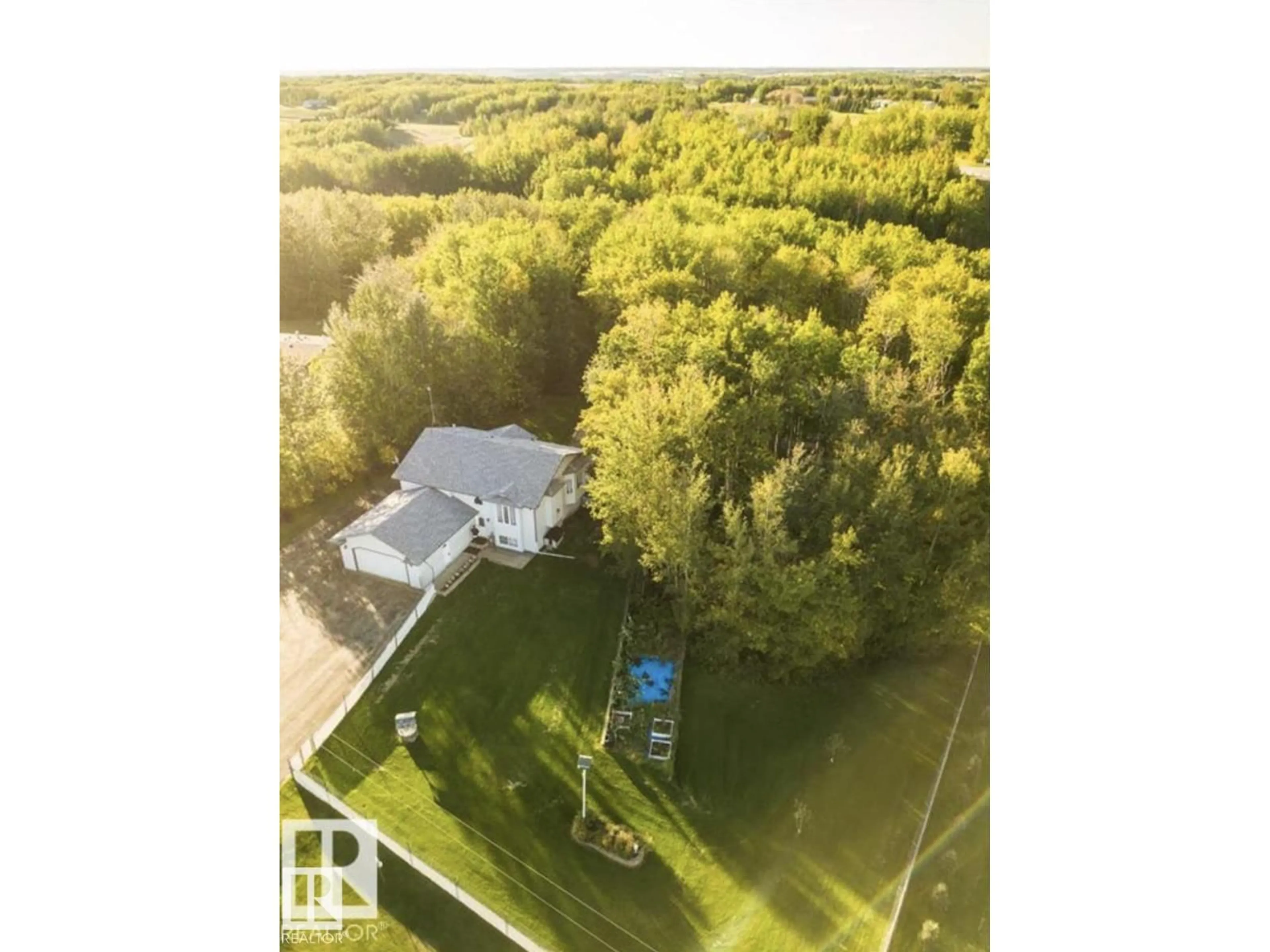 A pic from outside/outdoor area/front of a property/back of a property/a pic from drone, water/lake/river/ocean view for 53319 - 112 RGE ROAD 14, Rural Parkland County Alberta T7Y0C2