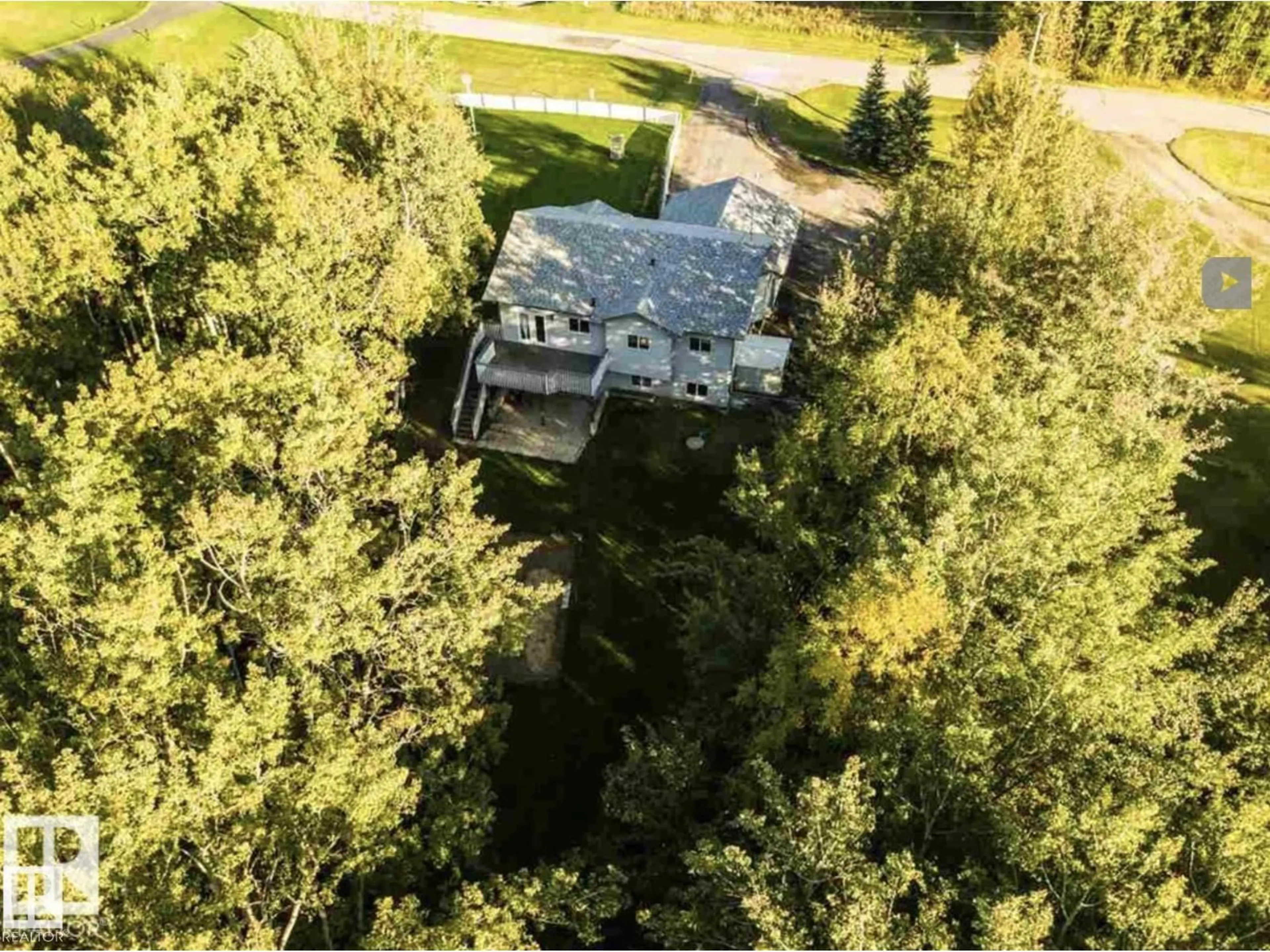 A pic from outside/outdoor area/front of a property/back of a property/a pic from drone, forest/trees view for 53319 - 112 RGE ROAD 14, Rural Parkland County Alberta T7Y0C2