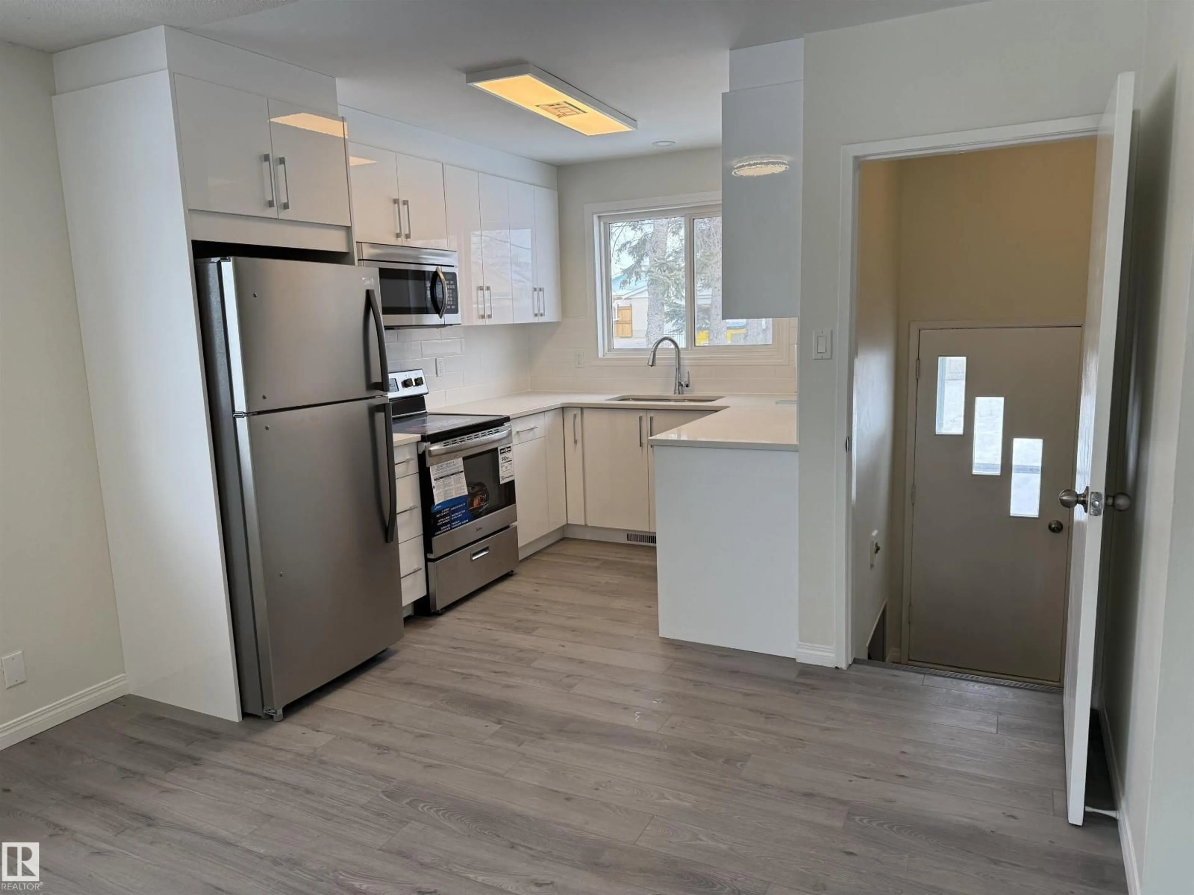 Open concept kitchen, unknown for NW - 13323 68 ST, Edmonton Alberta T5C0G1