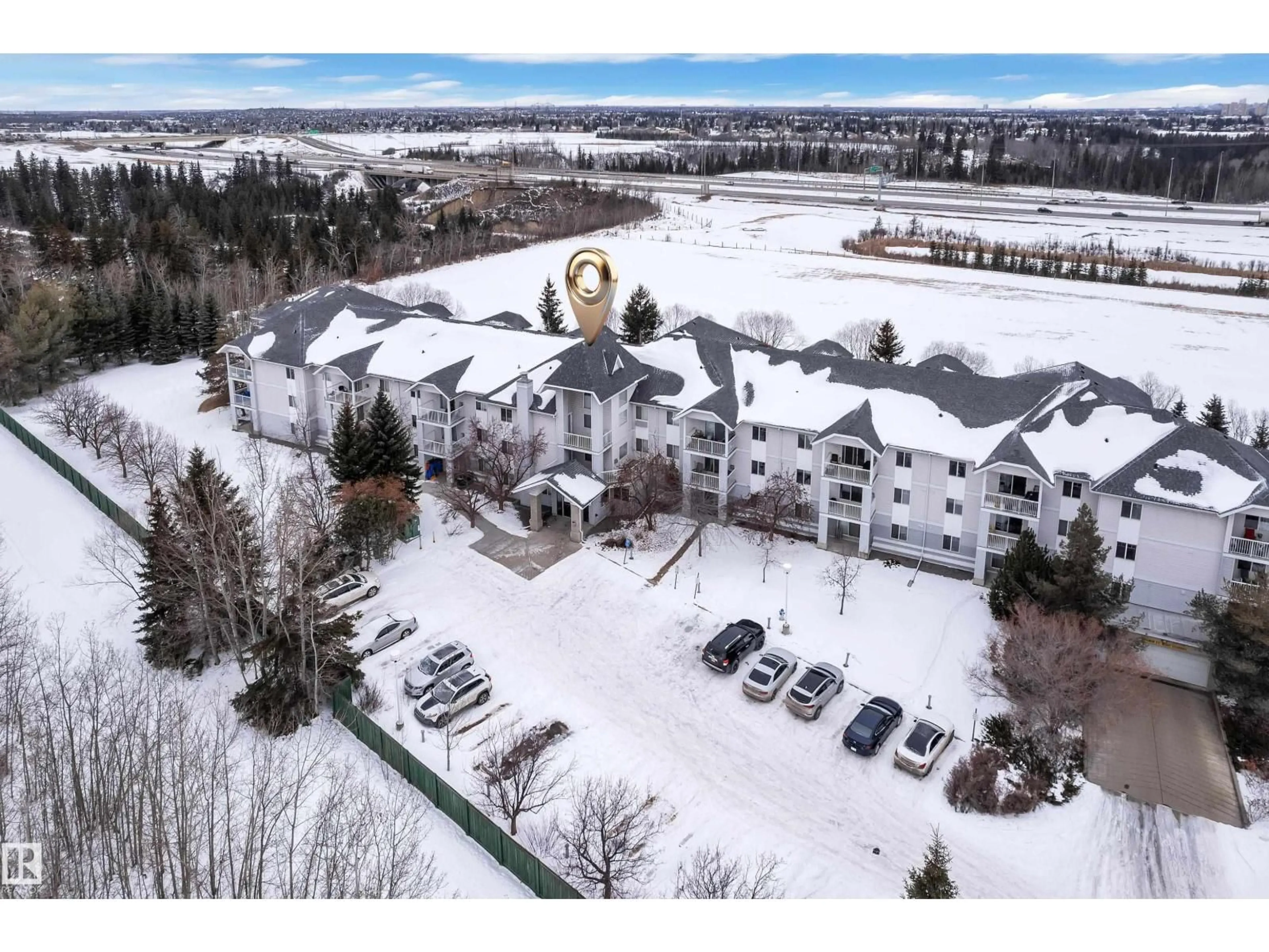 A pic from outside/outdoor area/front of a property/back of a property/a pic from drone, mountain view for #306 - 905 BLACKLOCK WY, Edmonton Alberta T6W1M7