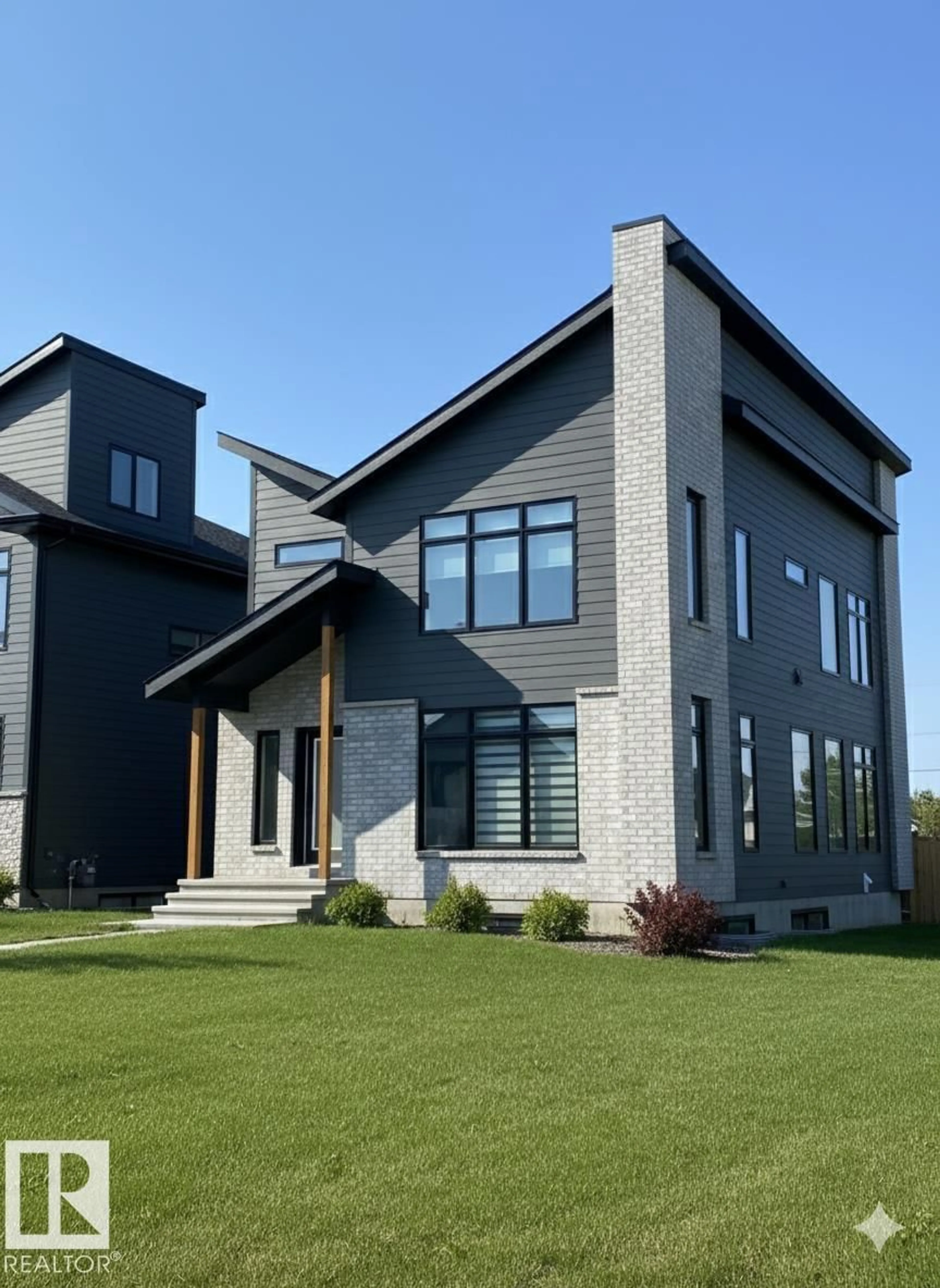 Home with brick exterior material, building for NW - 4142 122 ST, Edmonton Alberta T6J0W8