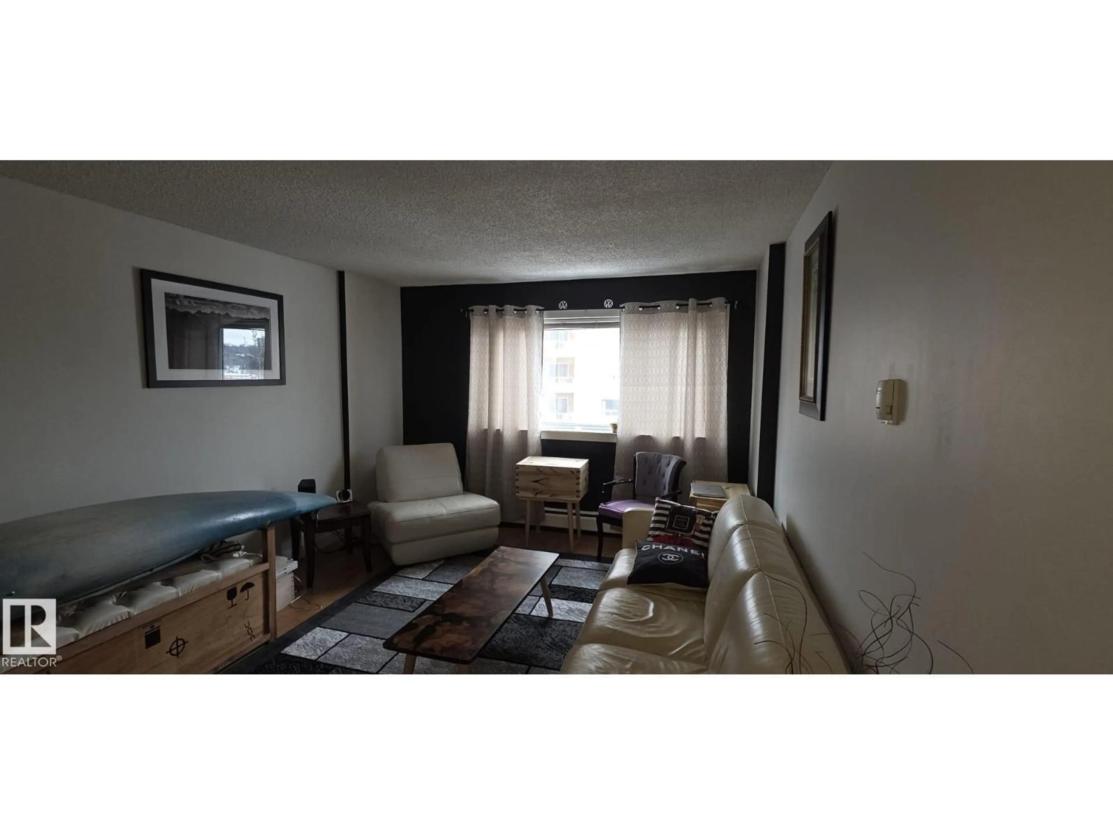 Living room with furniture, wood/laminate floor for 507 - 9710 105 ST NW, Edmonton Alberta T5K1A4