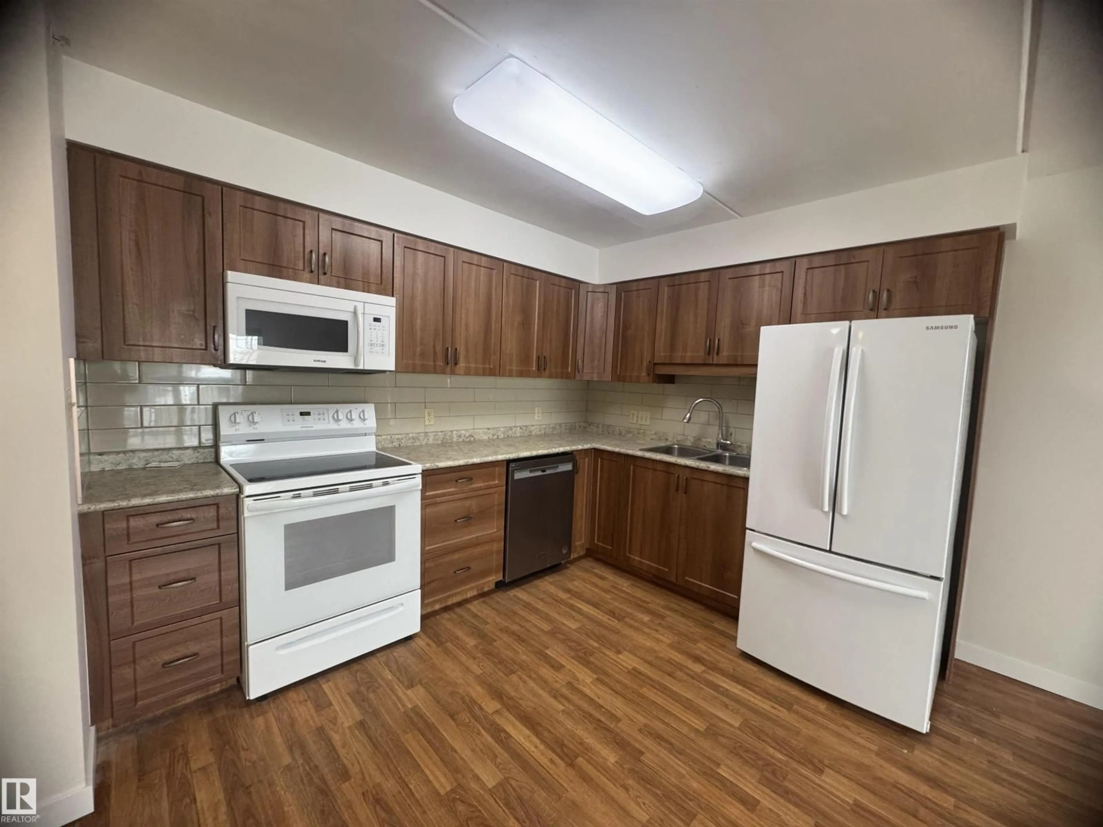 Standard kitchen, wood/laminate floor for 301 - 9928 105 ST, Westlock Alberta T7P1S7