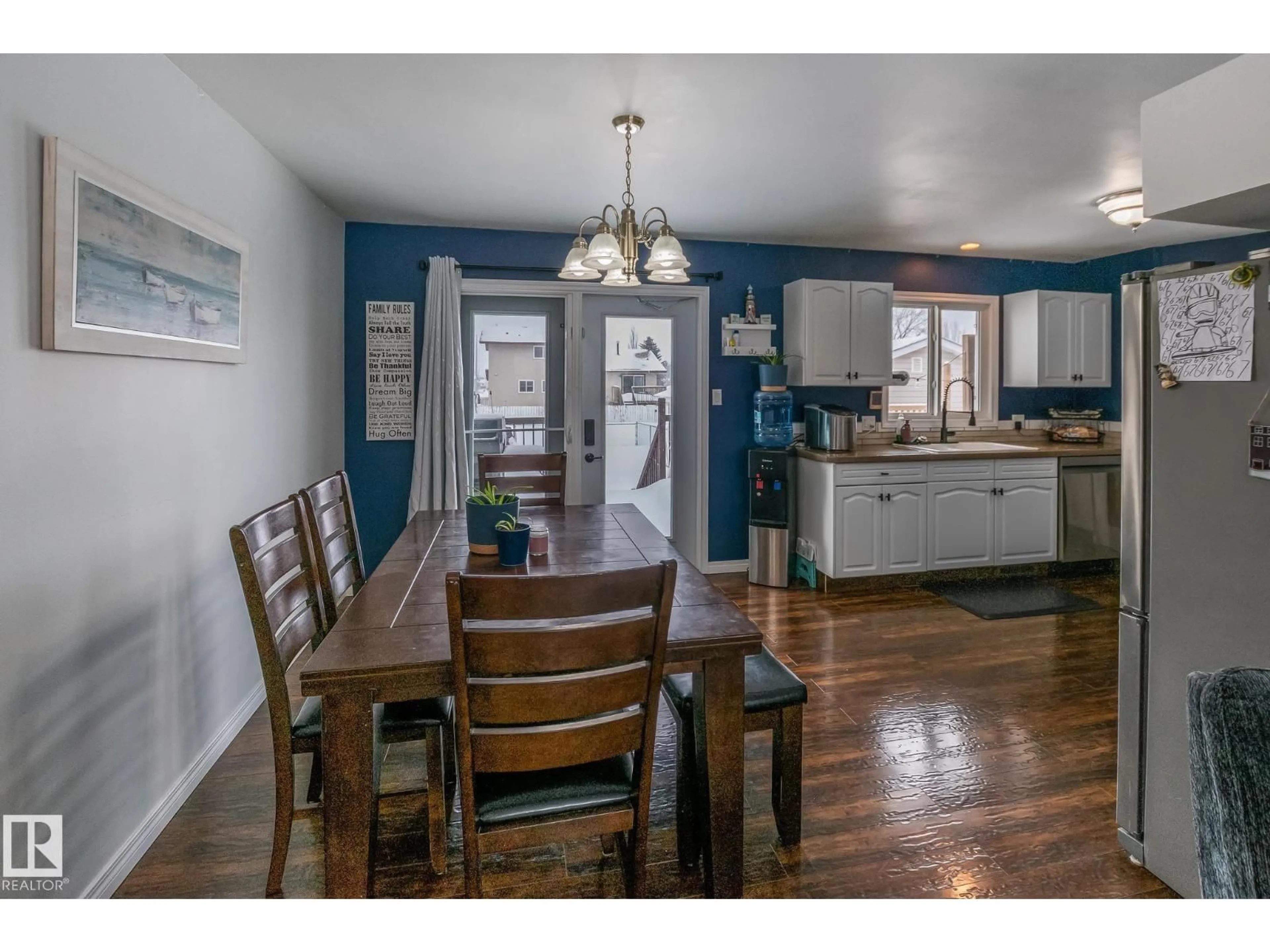 Open concept kitchen, wood/laminate floor for 4403 44 AV, Bonnyville Town Alberta T9N1X1