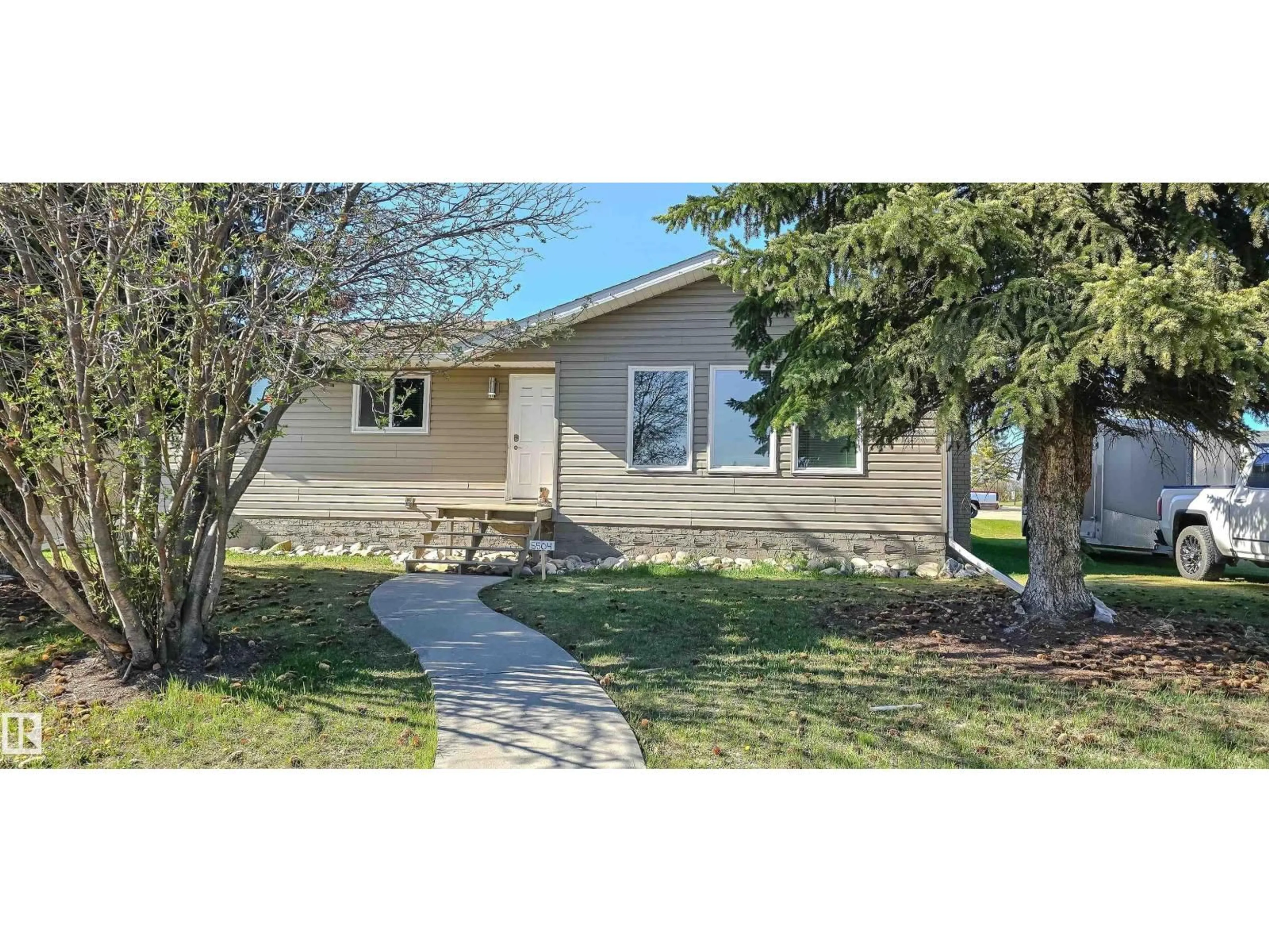 Home with vinyl exterior material, street for 5504 45 AV, Drayton Valley Alberta T7A1K3