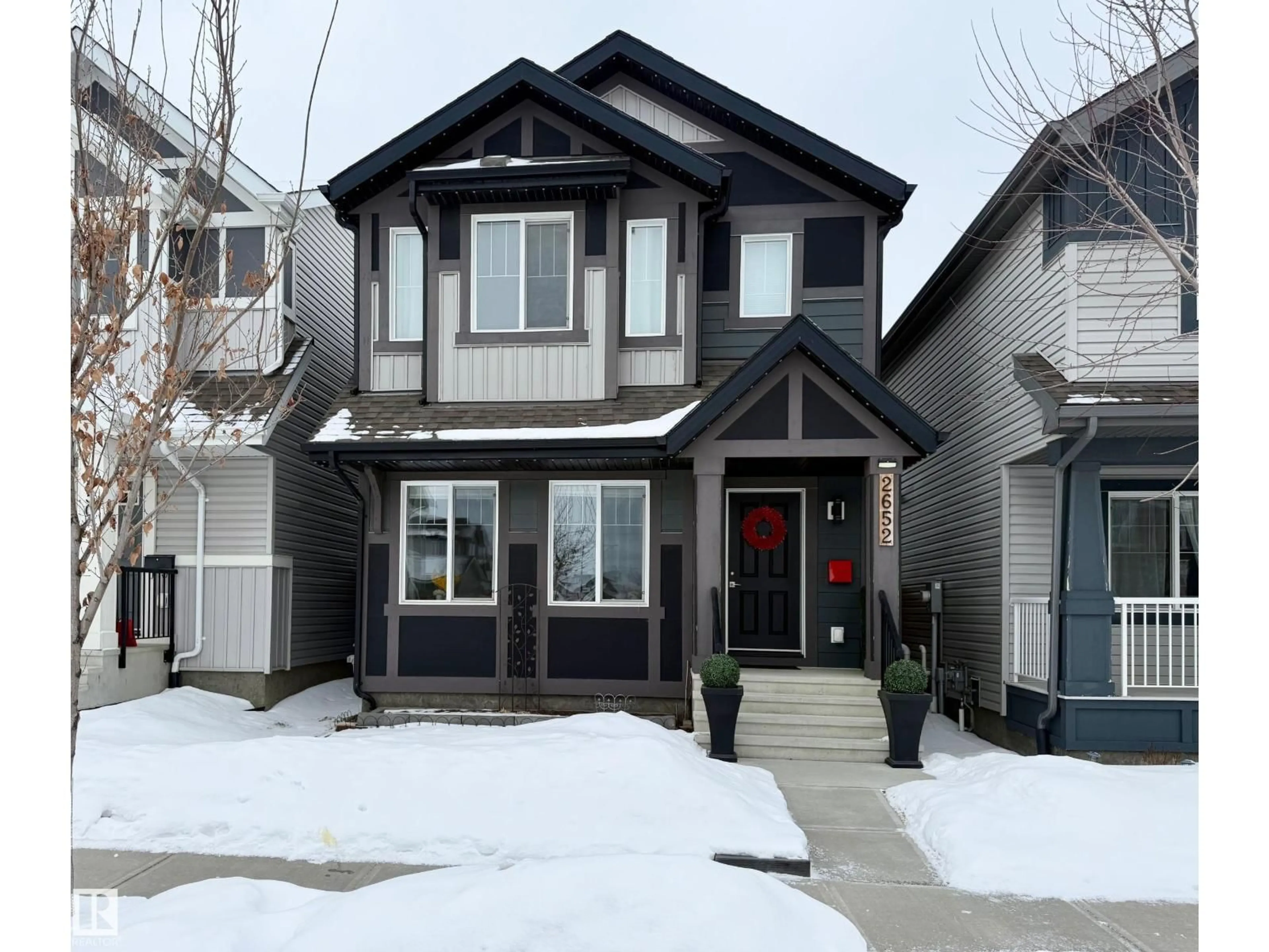Home with vinyl exterior material, street for 2652 MAPLE WY, Edmonton Alberta T6T2G3