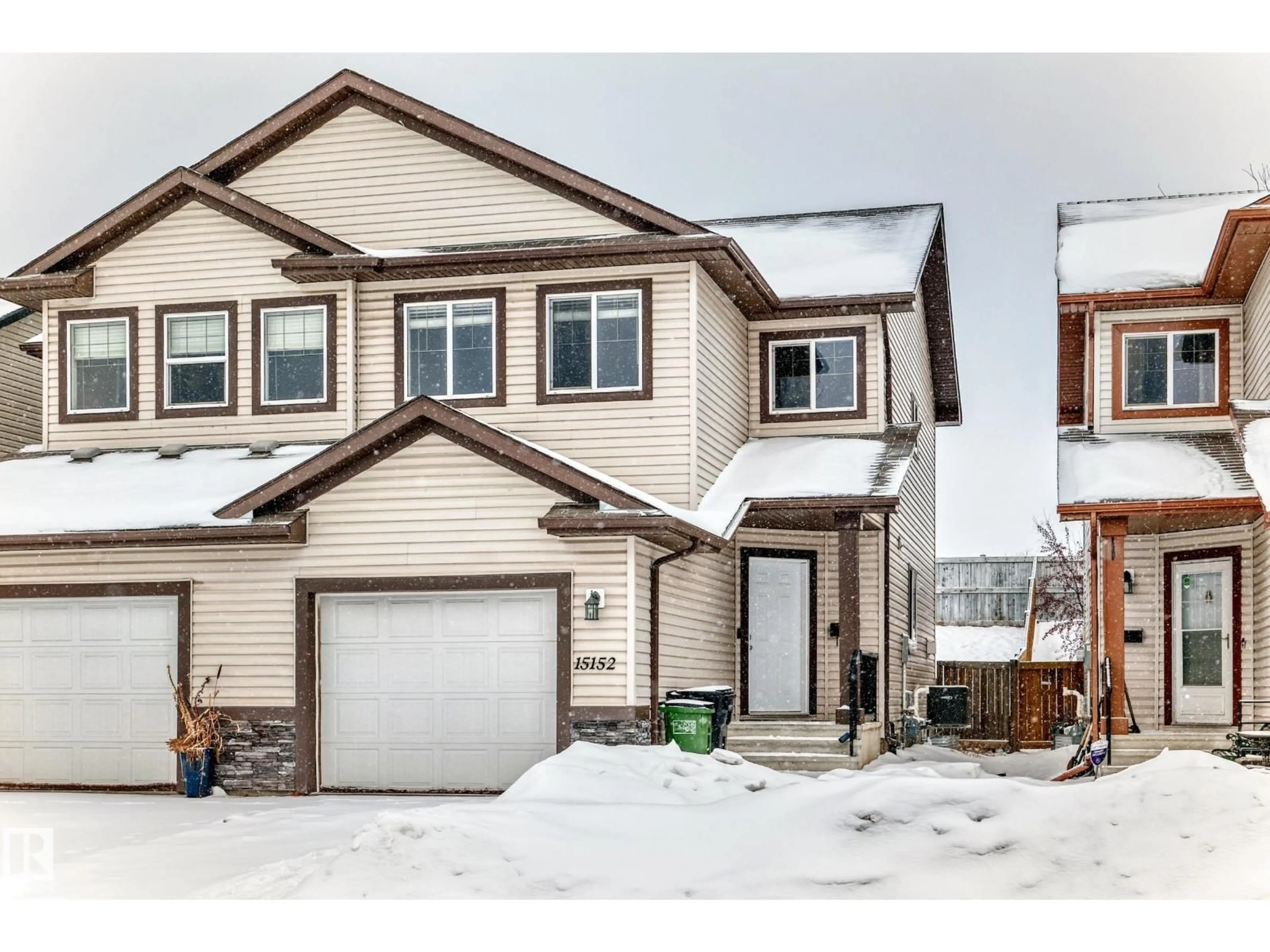 Home with vinyl exterior material, street for 15152 33 ST, Edmonton Alberta T5Y0J7